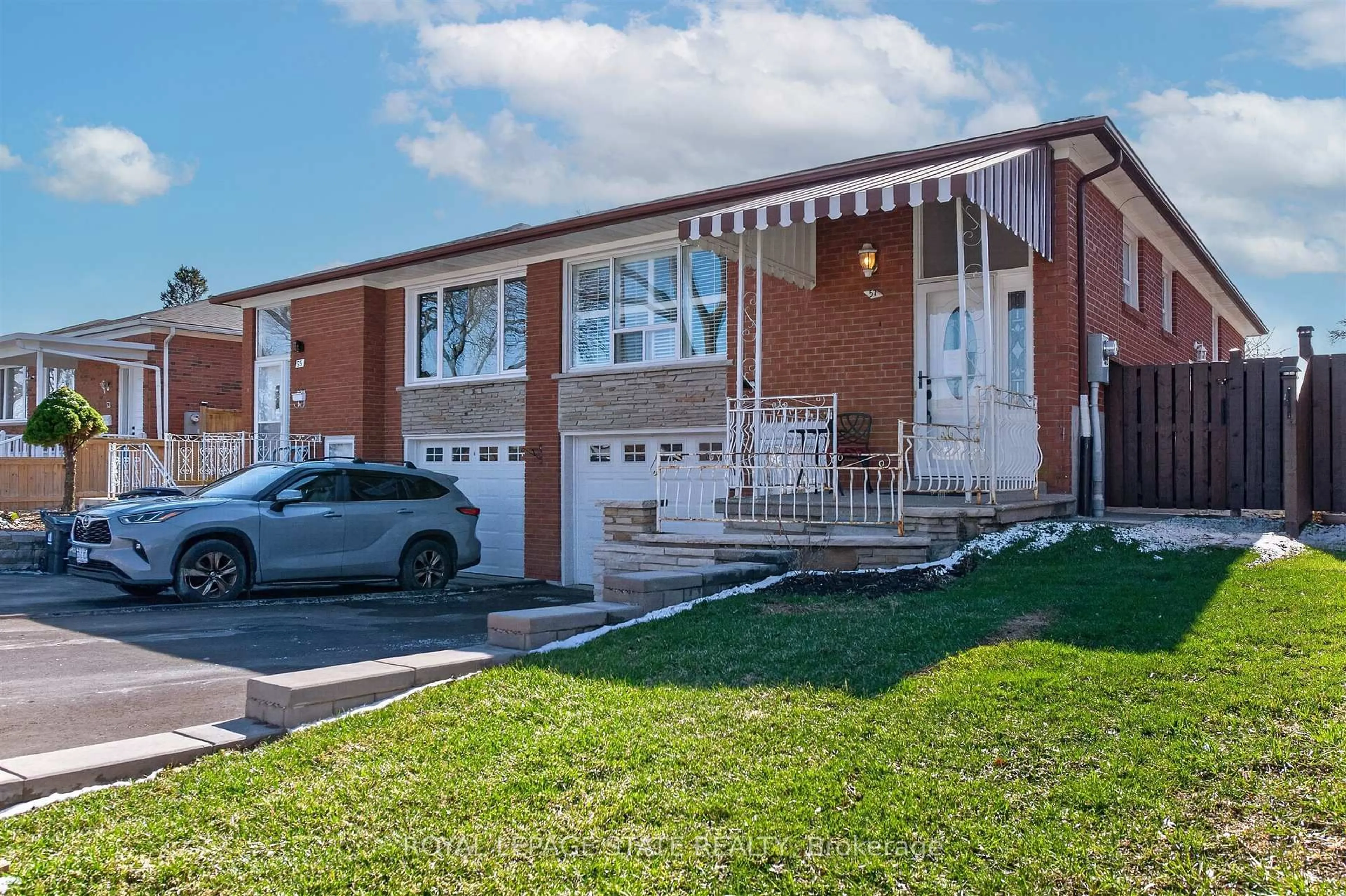 Home with brick exterior material, street for 57 Starview Dr, Toronto Ontario M9M 1K7