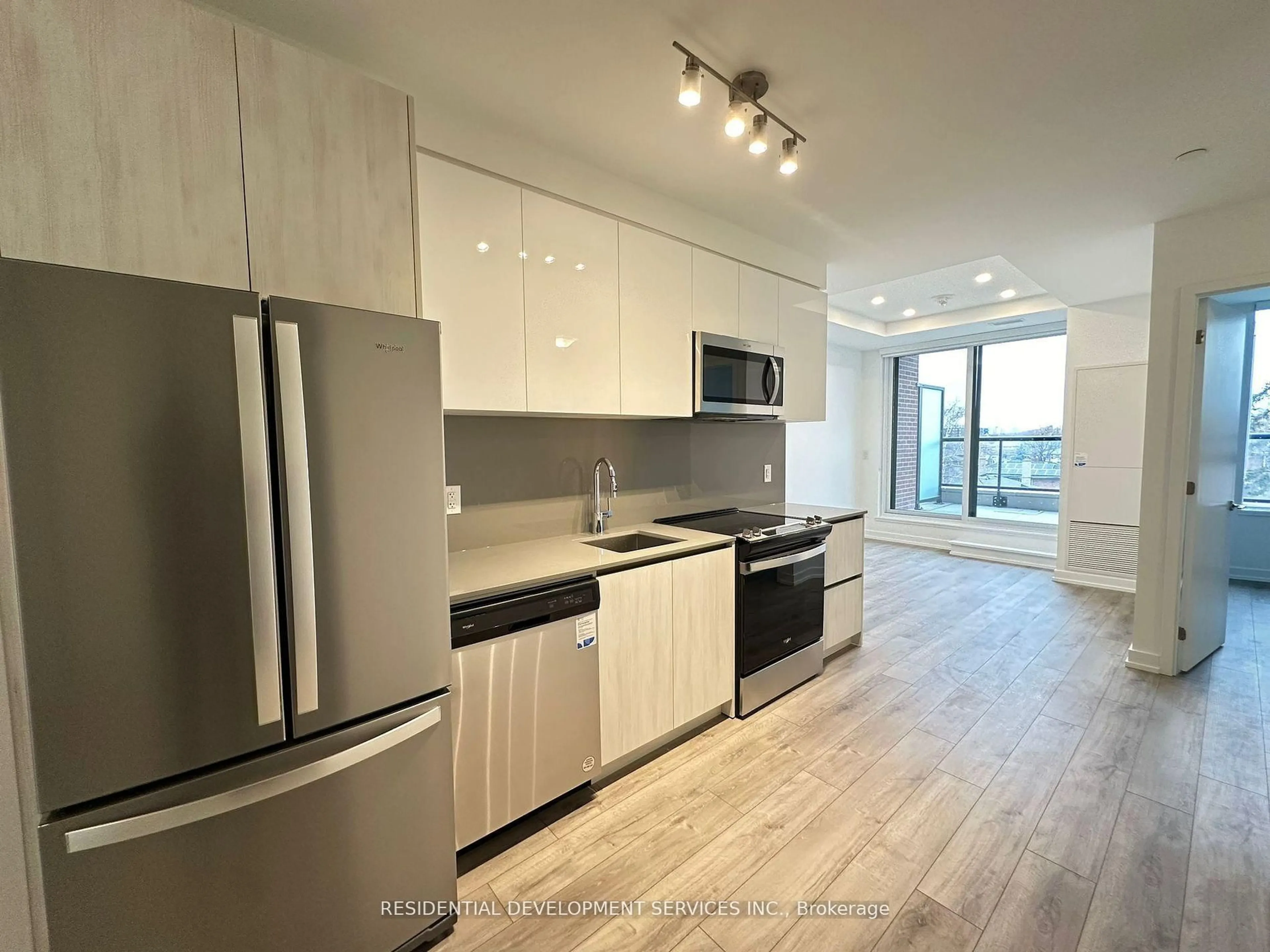 Open concept kitchen, wood/laminate floor for 3100 Keele St #314, Toronto Ontario M3M 0E1