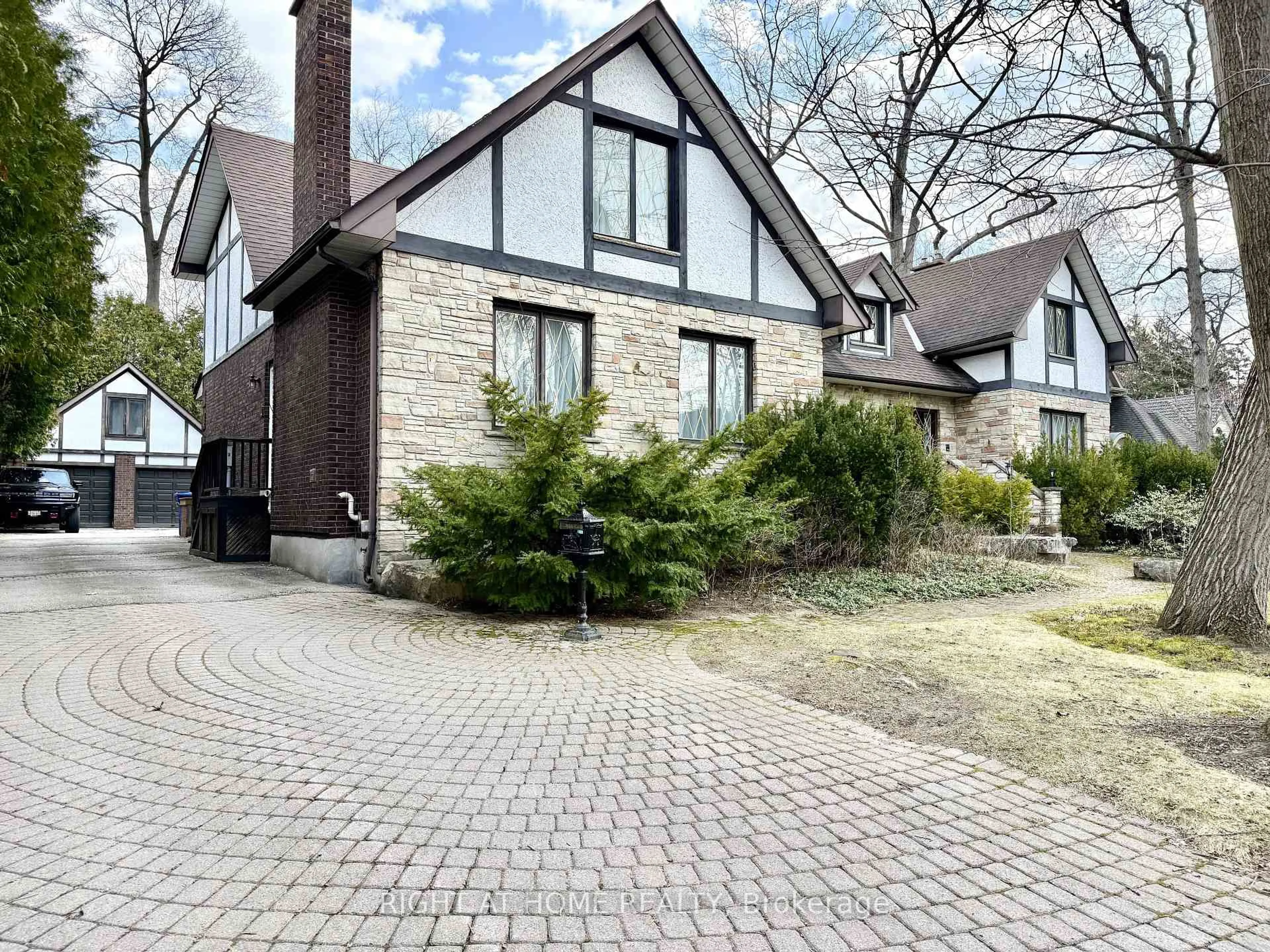 Home with brick exterior material, street for 2123 Gordon Dr, Mississauga Ontario L5B 1S6
