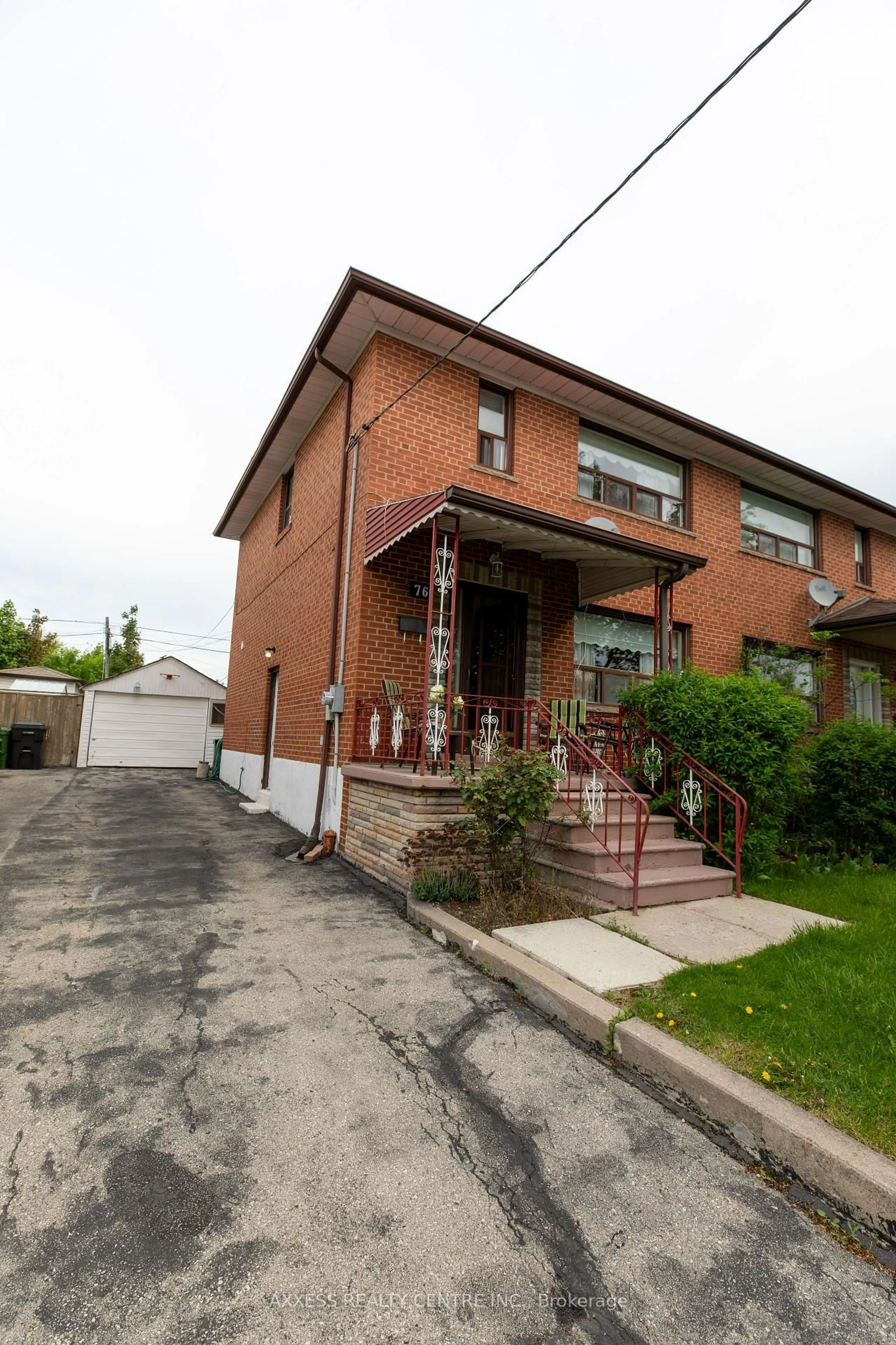 Home with brick exterior material, street for 76 Dombey Rd, Toronto Ontario M3L 1P2