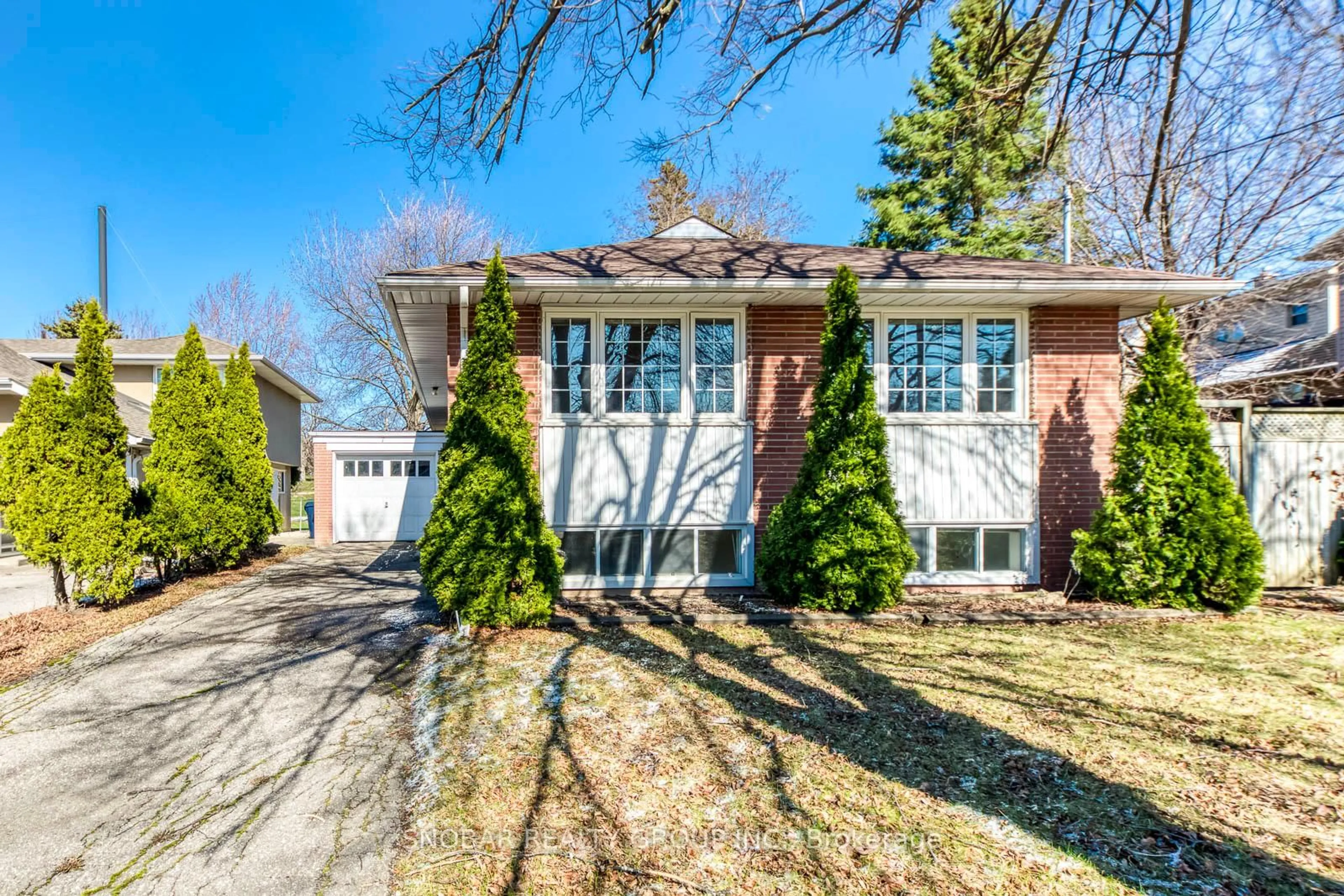 Home with brick exterior material, street for 7 Golfwood Hts, Toronto Ontario M9P 3L8