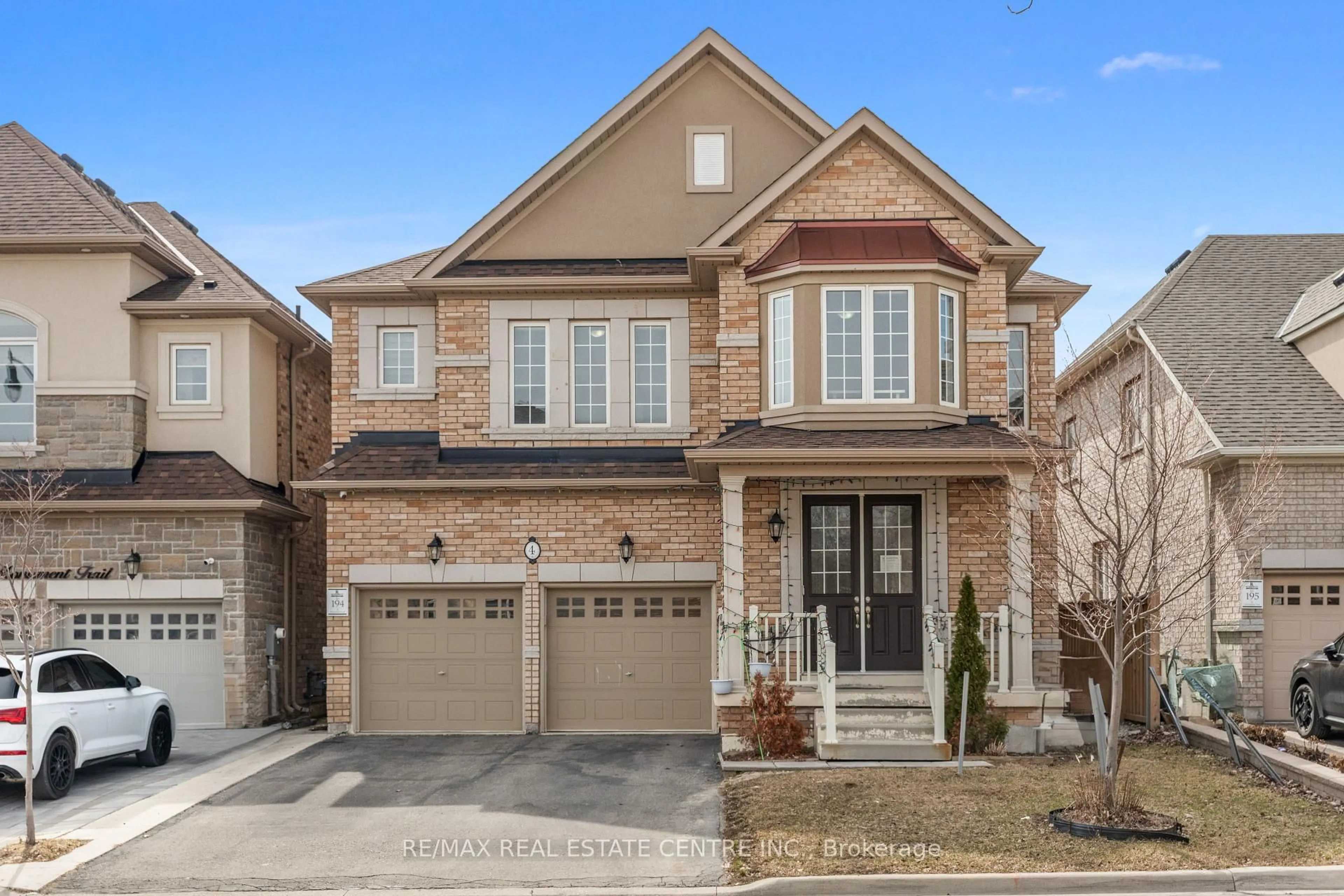 Home with brick exterior material, street for 4 Monument Tr, Brampton Ontario L7A 4M8