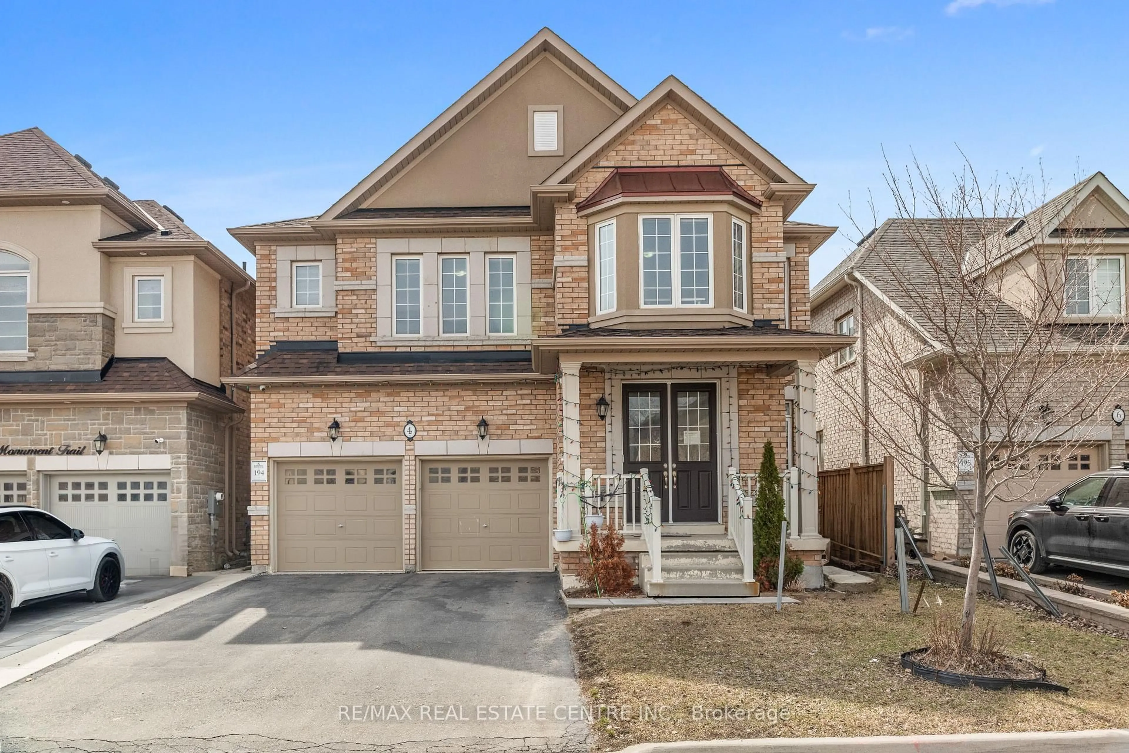 Home with brick exterior material, street for 4 Monument Tr, Brampton Ontario L7A 4M8