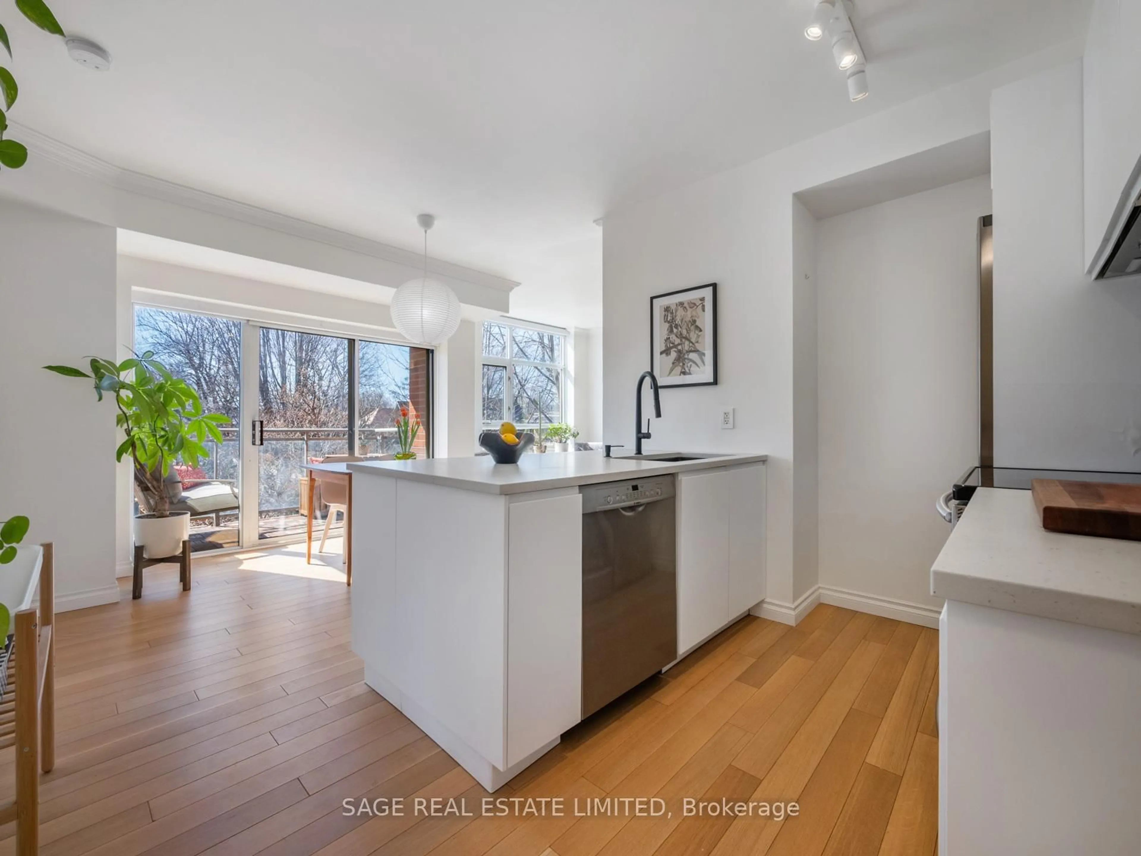Open concept kitchen, unknown for 2495 Dundas St #305, Toronto Ontario M6P 1X4