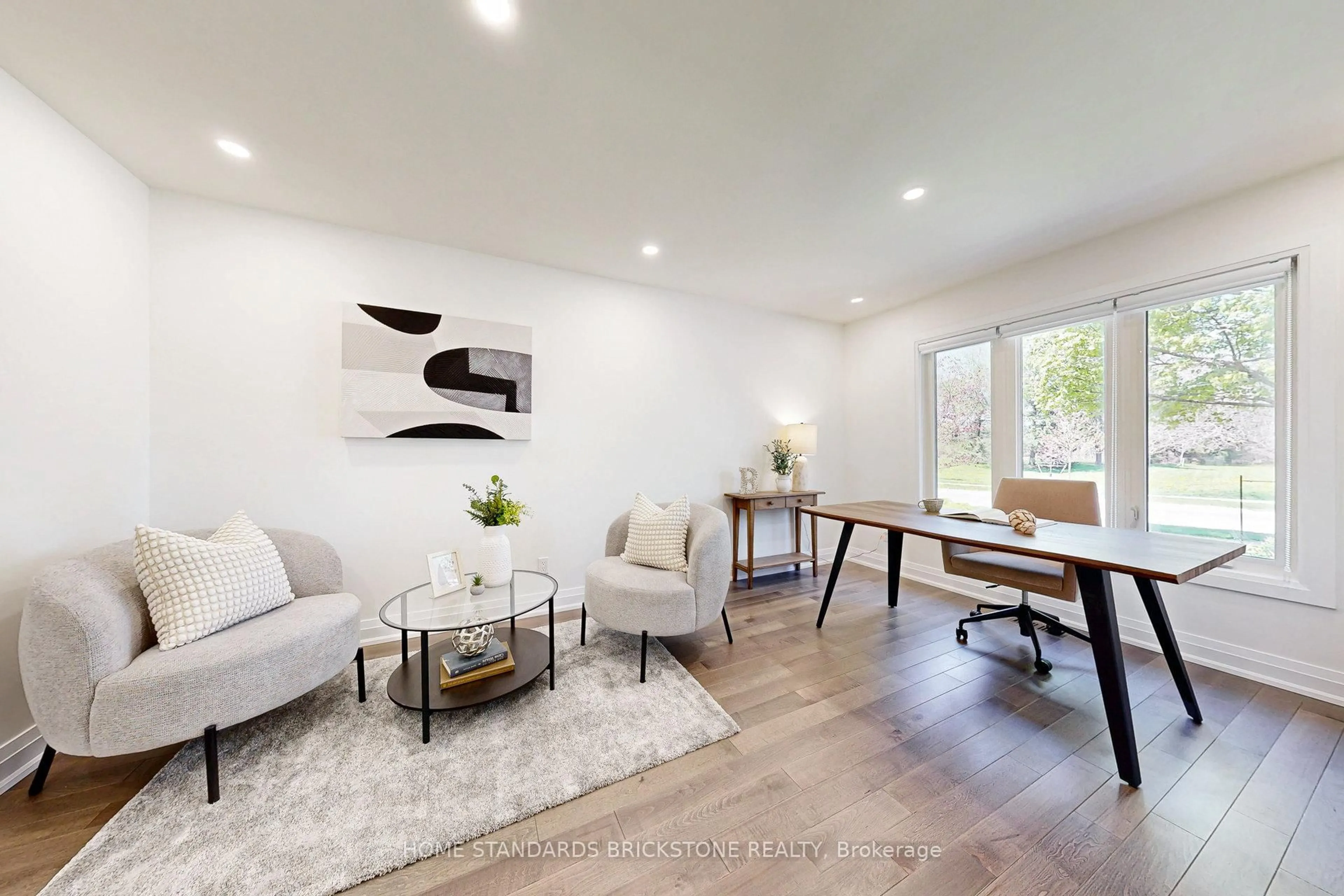 Living room with furniture, wood/laminate floor for 460 Aspen Forest Dr, Oakville Ontario L6J 6H6