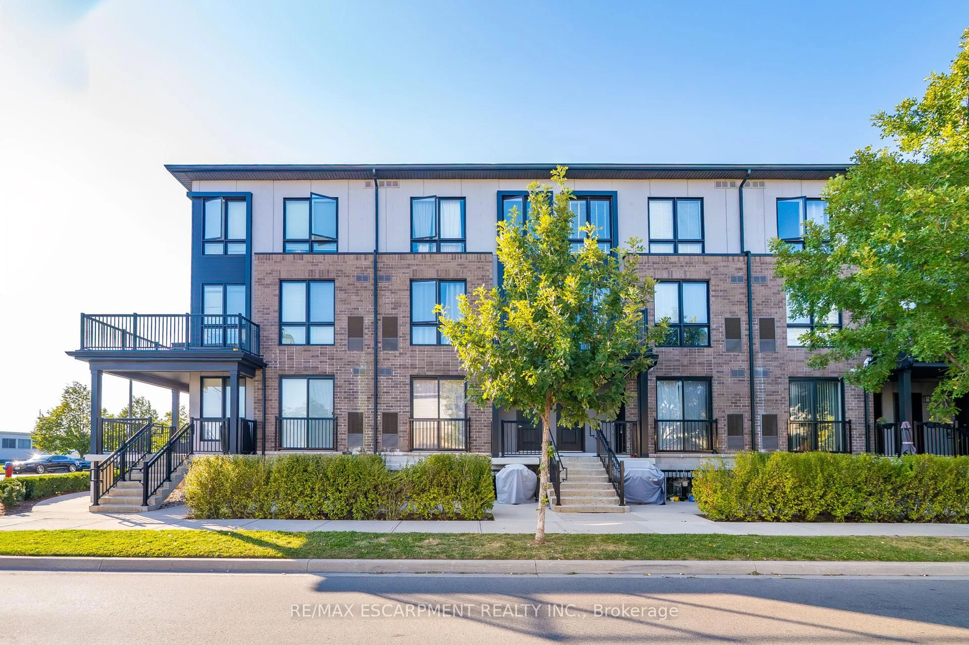 Home with brick exterior material, street for 1206 Main St #107, Milton Ontario L9T 9K6