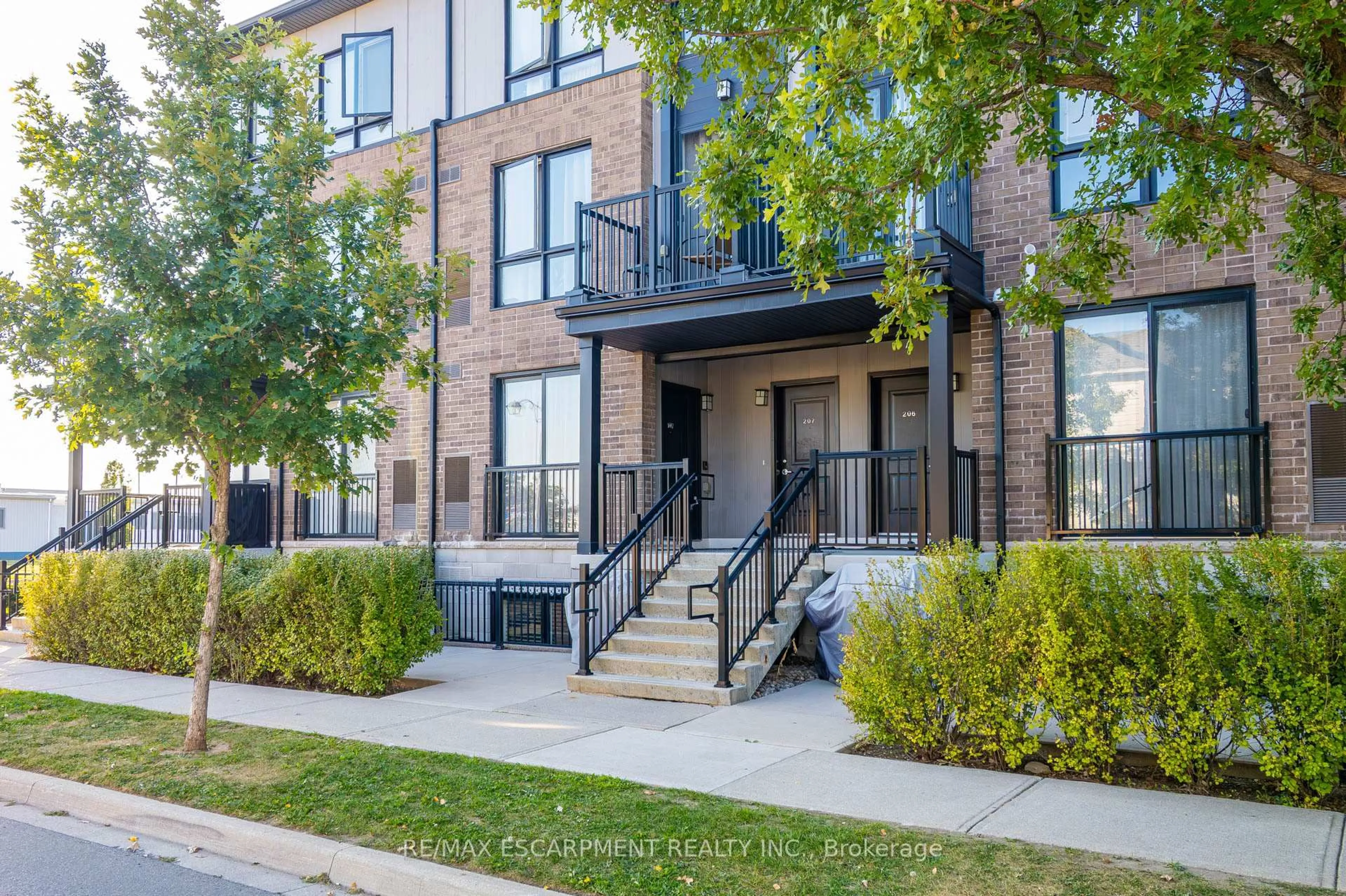 Home with brick exterior material, street for 1206 Main St #107, Milton Ontario L9T 9K6