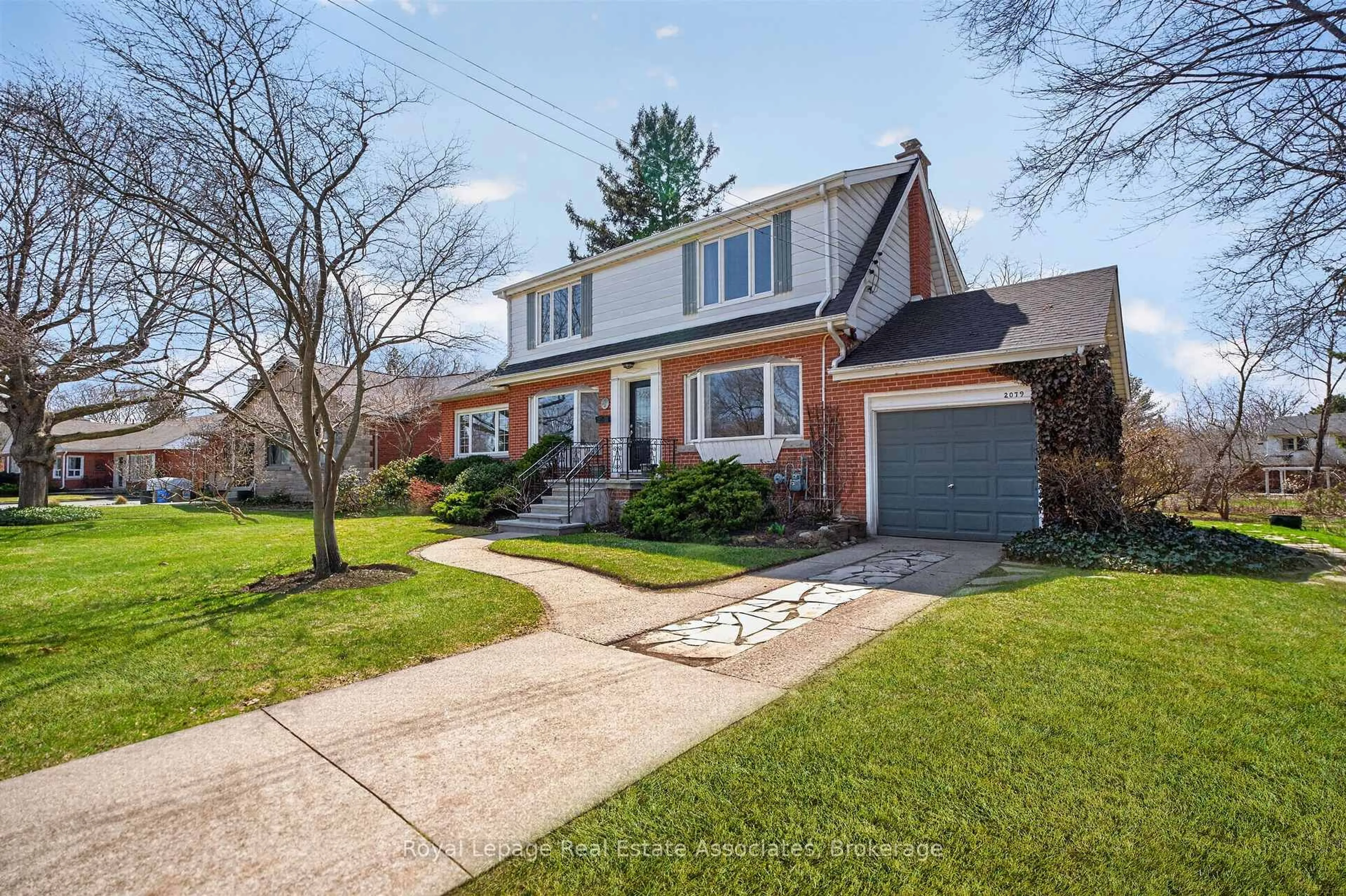 Home with brick exterior material, street for 2079 Deyncourt Dr, Burlington Ontario L7R 1W2