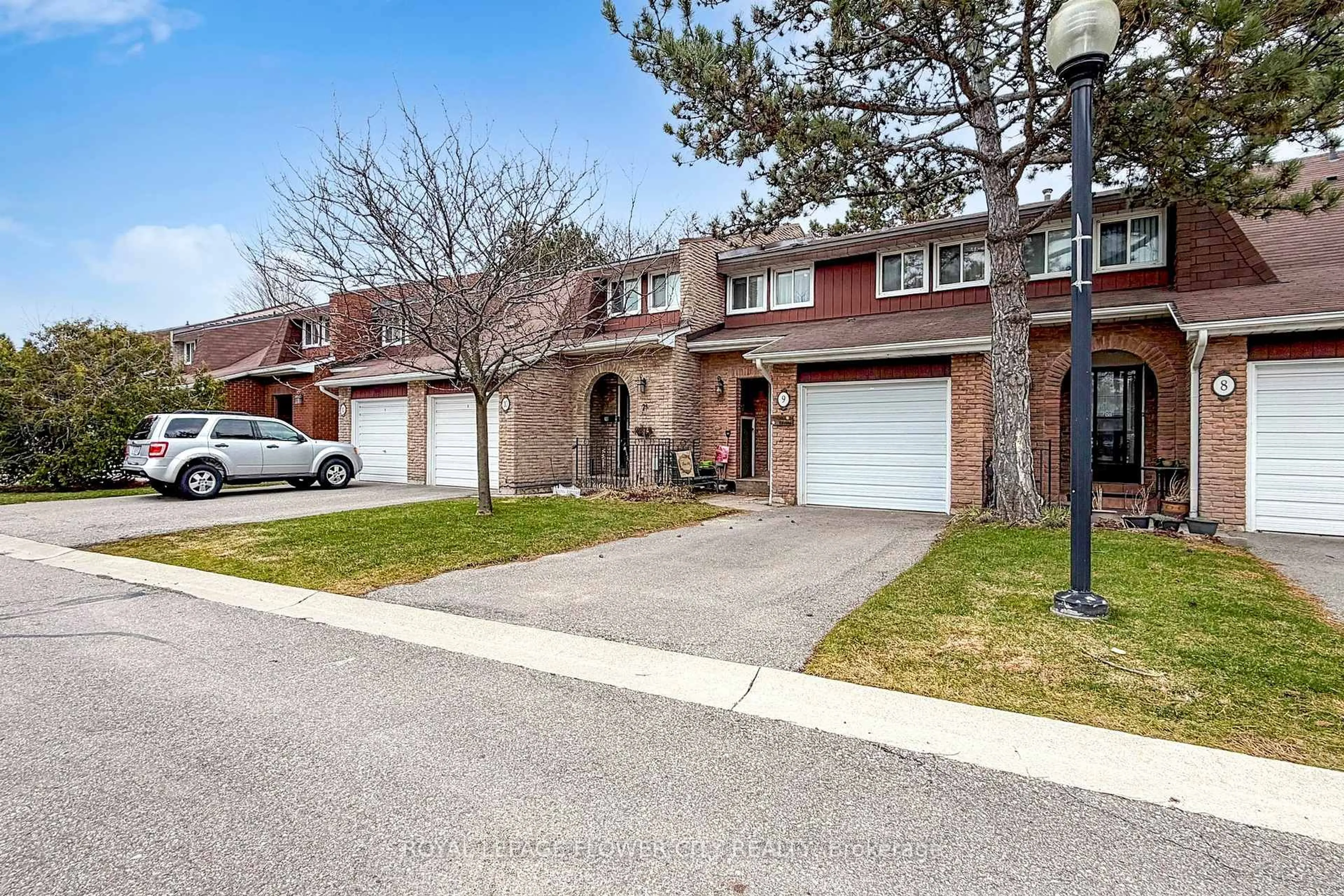 Home with brick exterior material, street for 3350 Hornbeam Cres #9, Mississauga Ontario L5L 3Z7