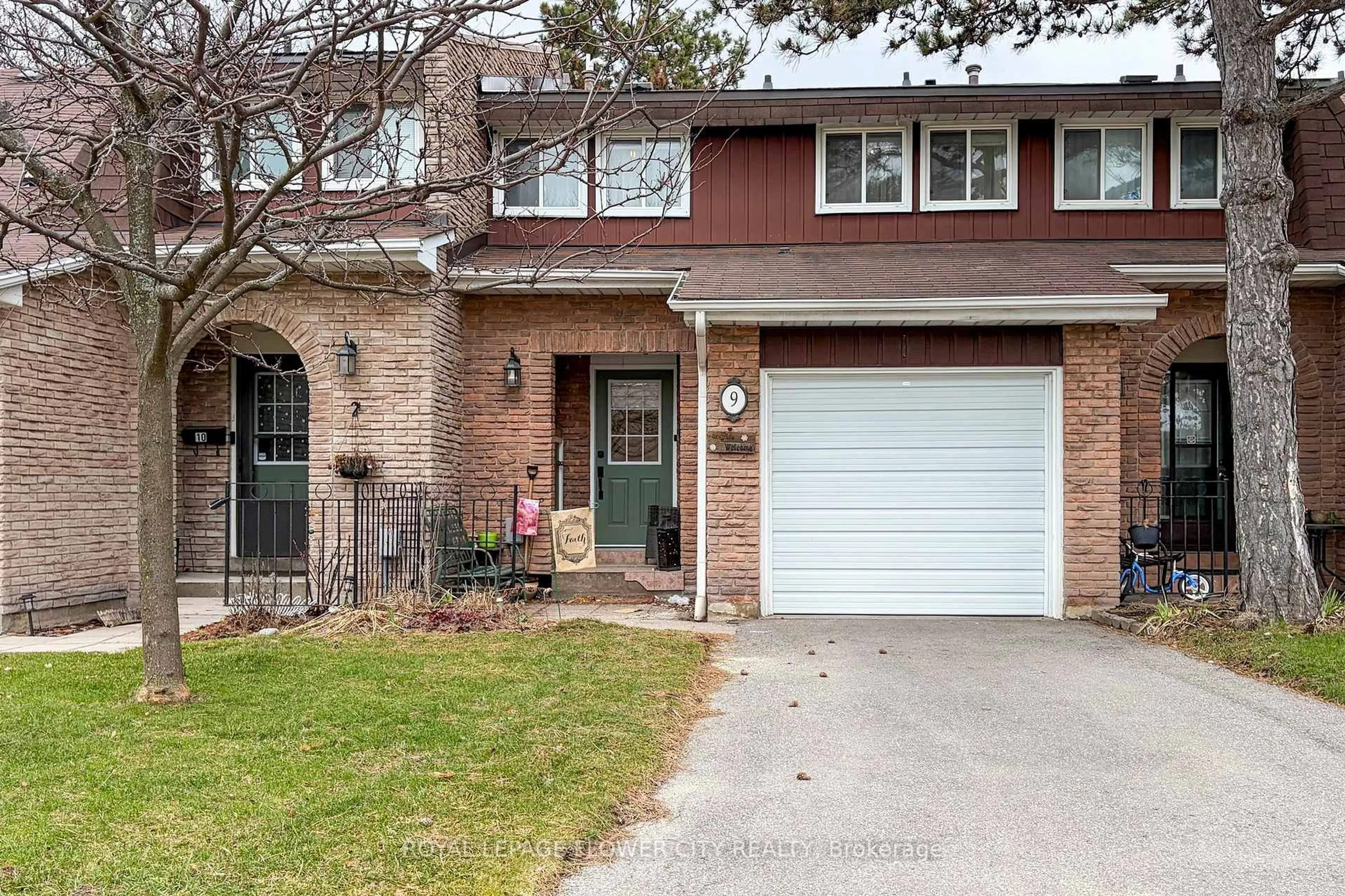 Home with brick exterior material, street for 3350 Hornbeam Cres #9, Mississauga Ontario L5L 3Z7