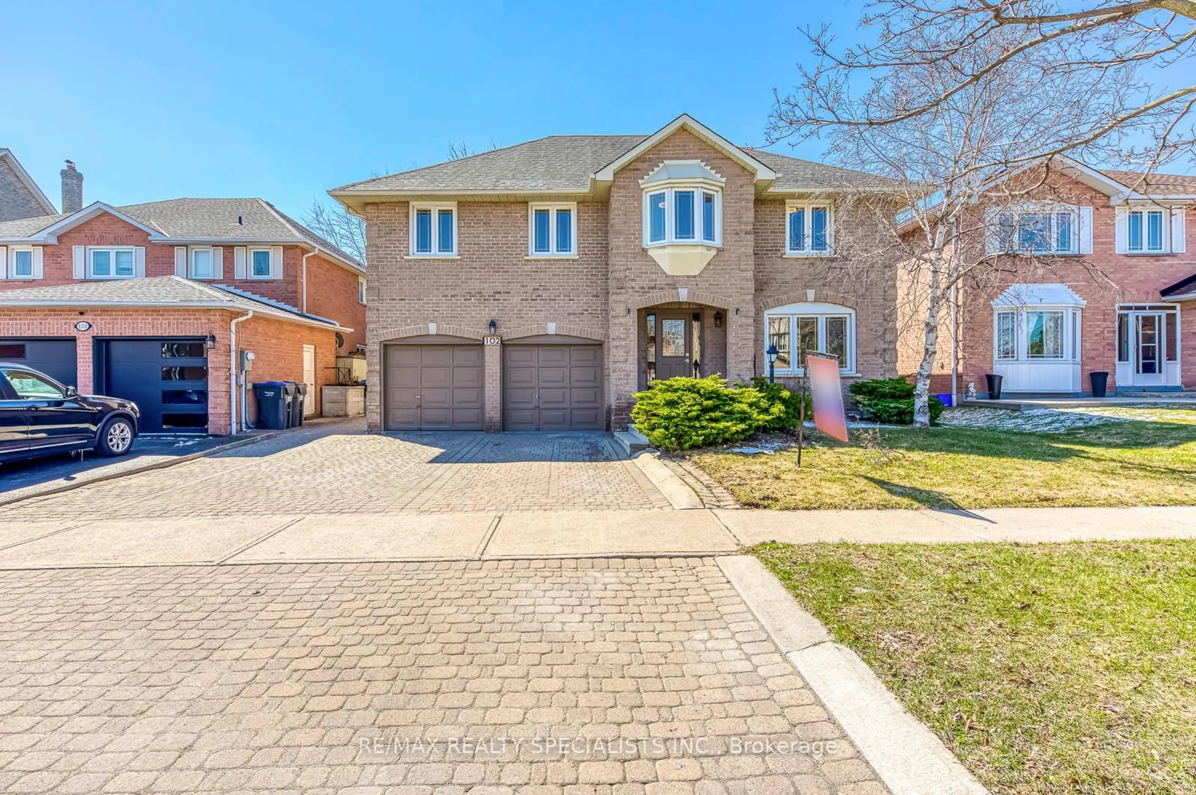 Home with brick exterior material, street for 102 Sunforest Dr, Brampton Ontario L6Z 4B2