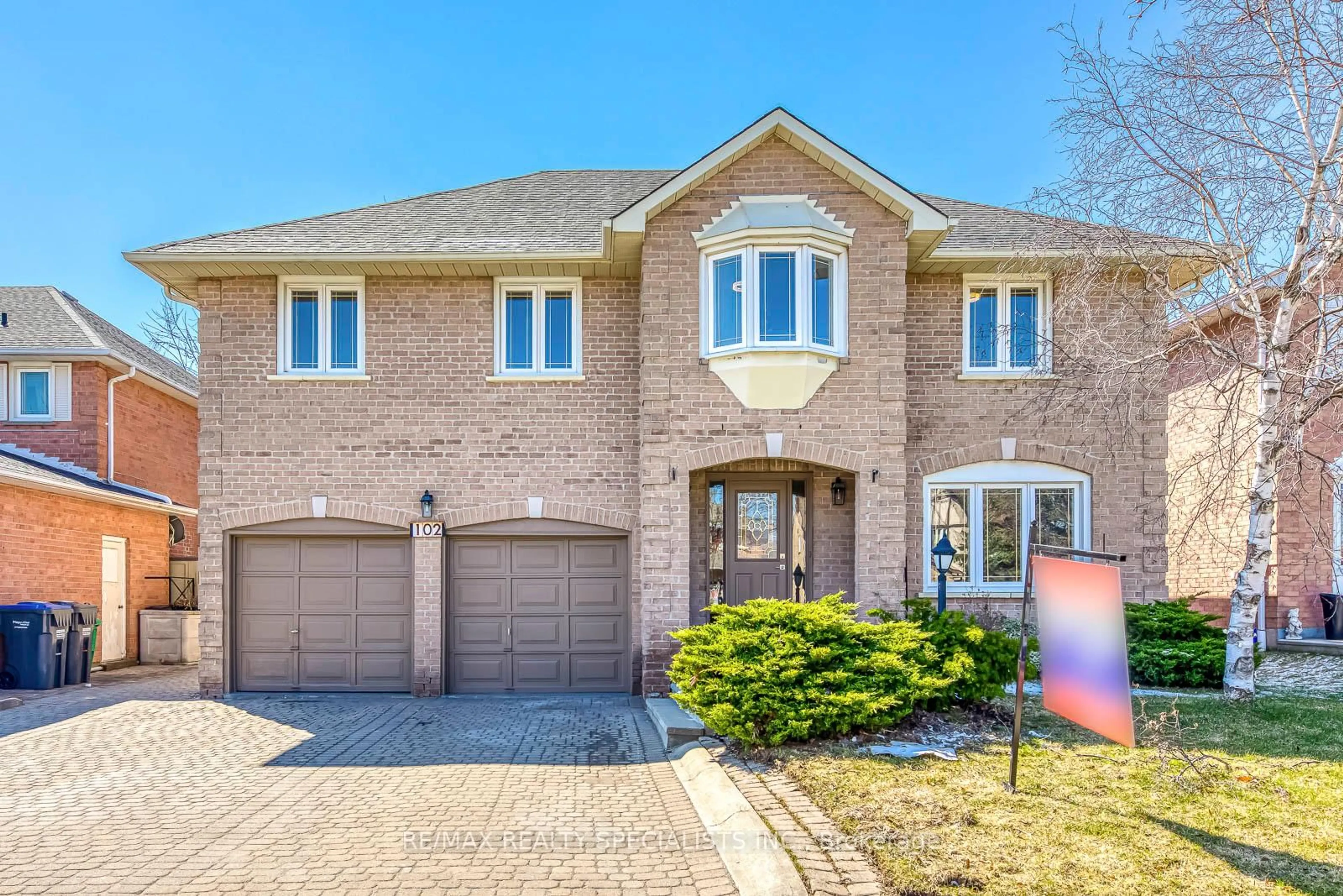 Home with brick exterior material, street for 102 Sunforest Dr, Brampton Ontario L6Z 4B2