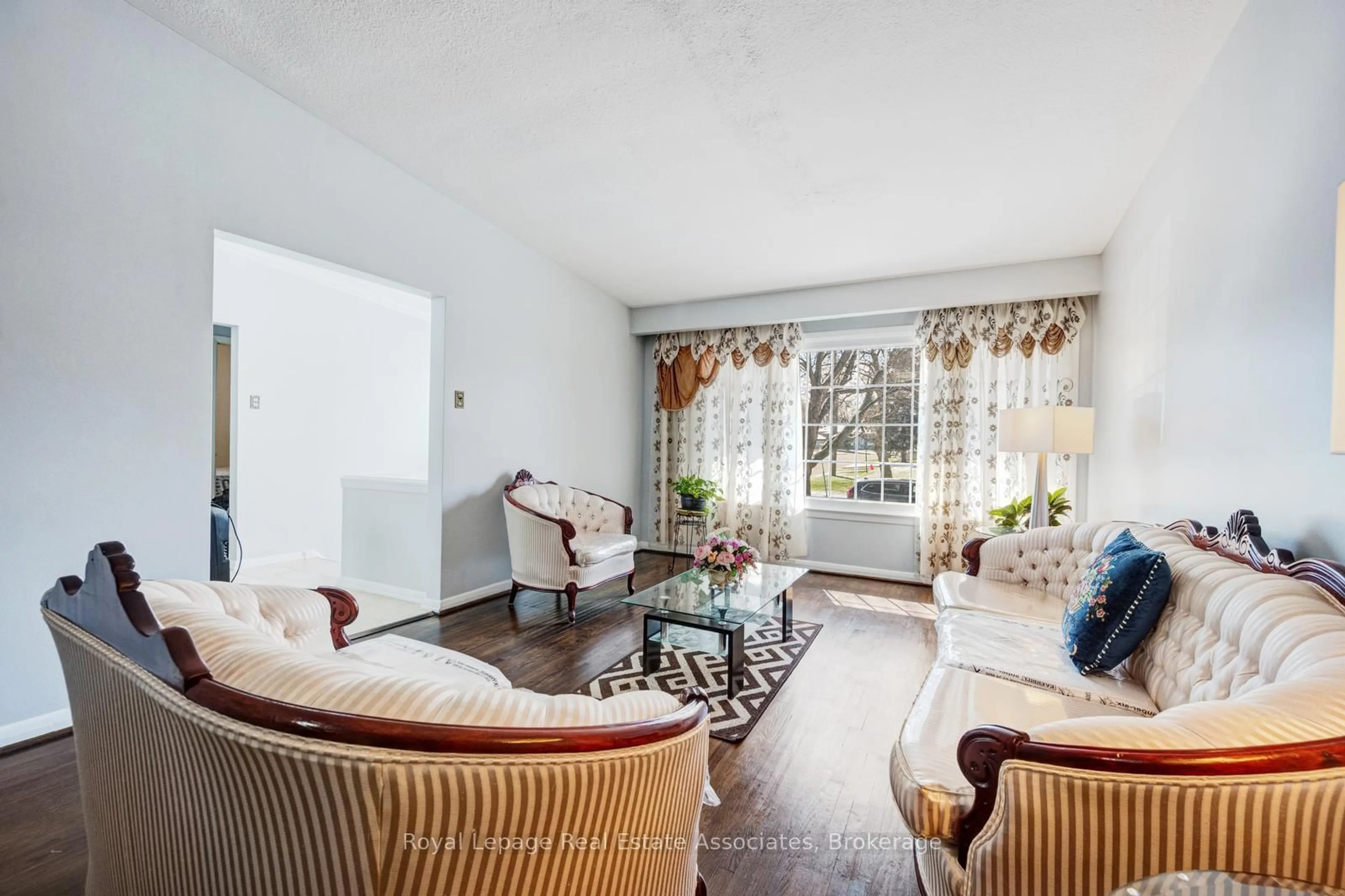 Living room with furniture, unknown for 8 Caulfield Rd, Toronto Ontario M9W 1W8