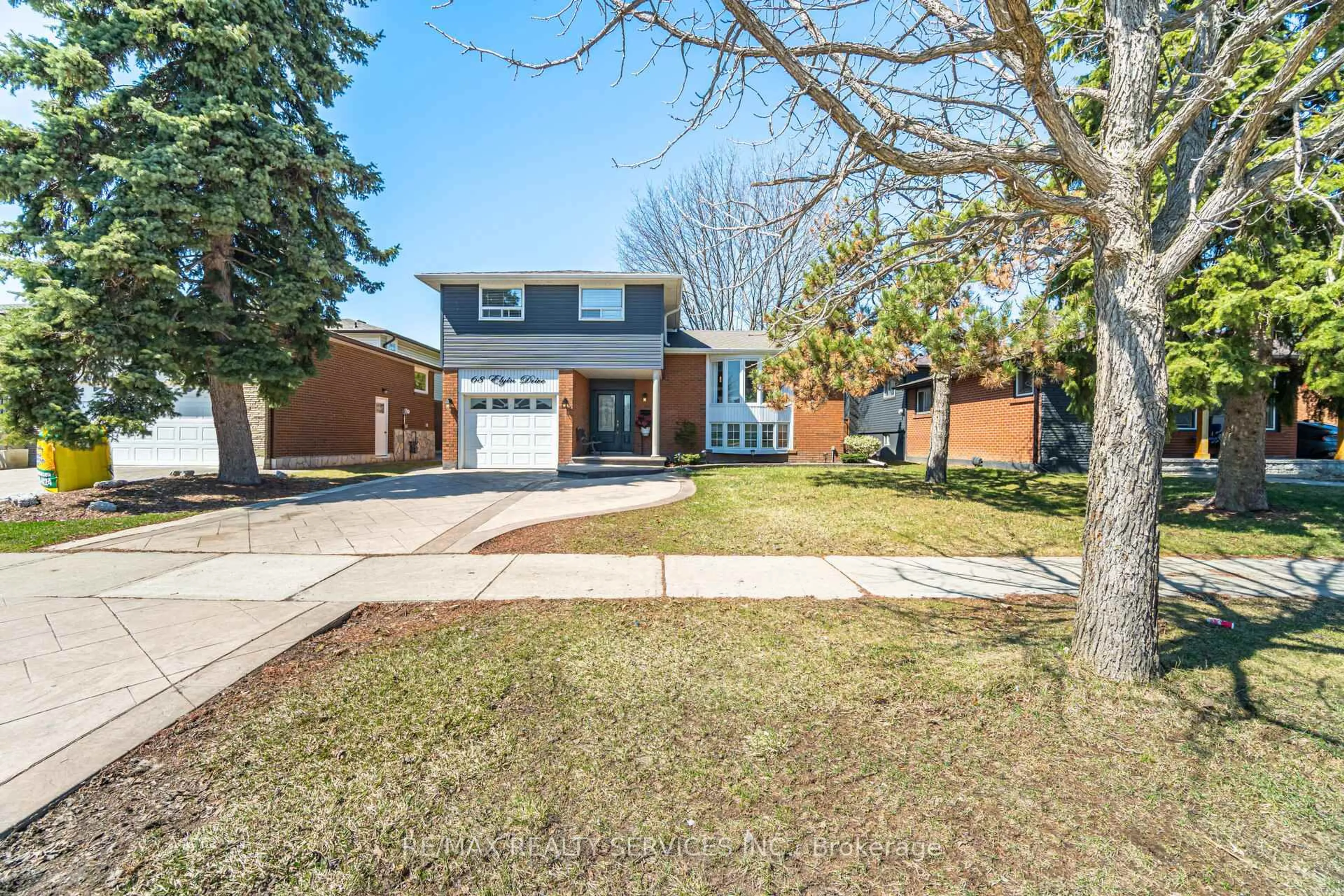 Home with brick exterior material, street for 68 Elgin Dr, Brampton Ontario L6Y 1A8