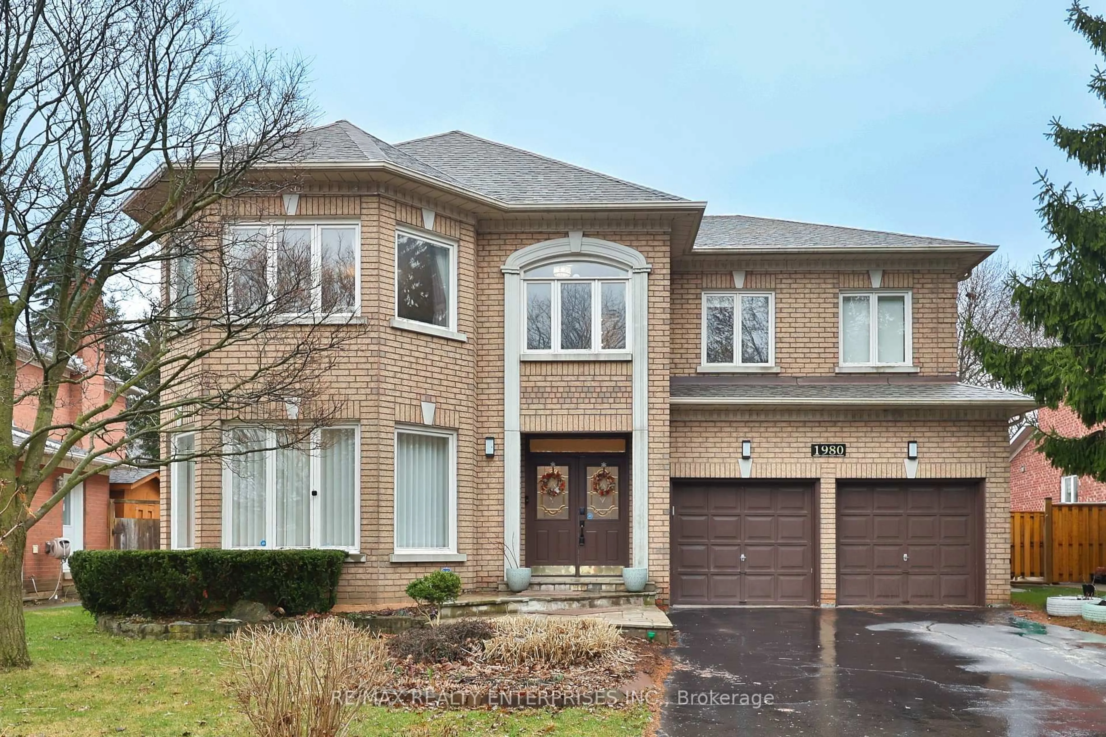 Home with brick exterior material, street for 1980 Calgary Crt, Mississauga Ontario L5H 4J1