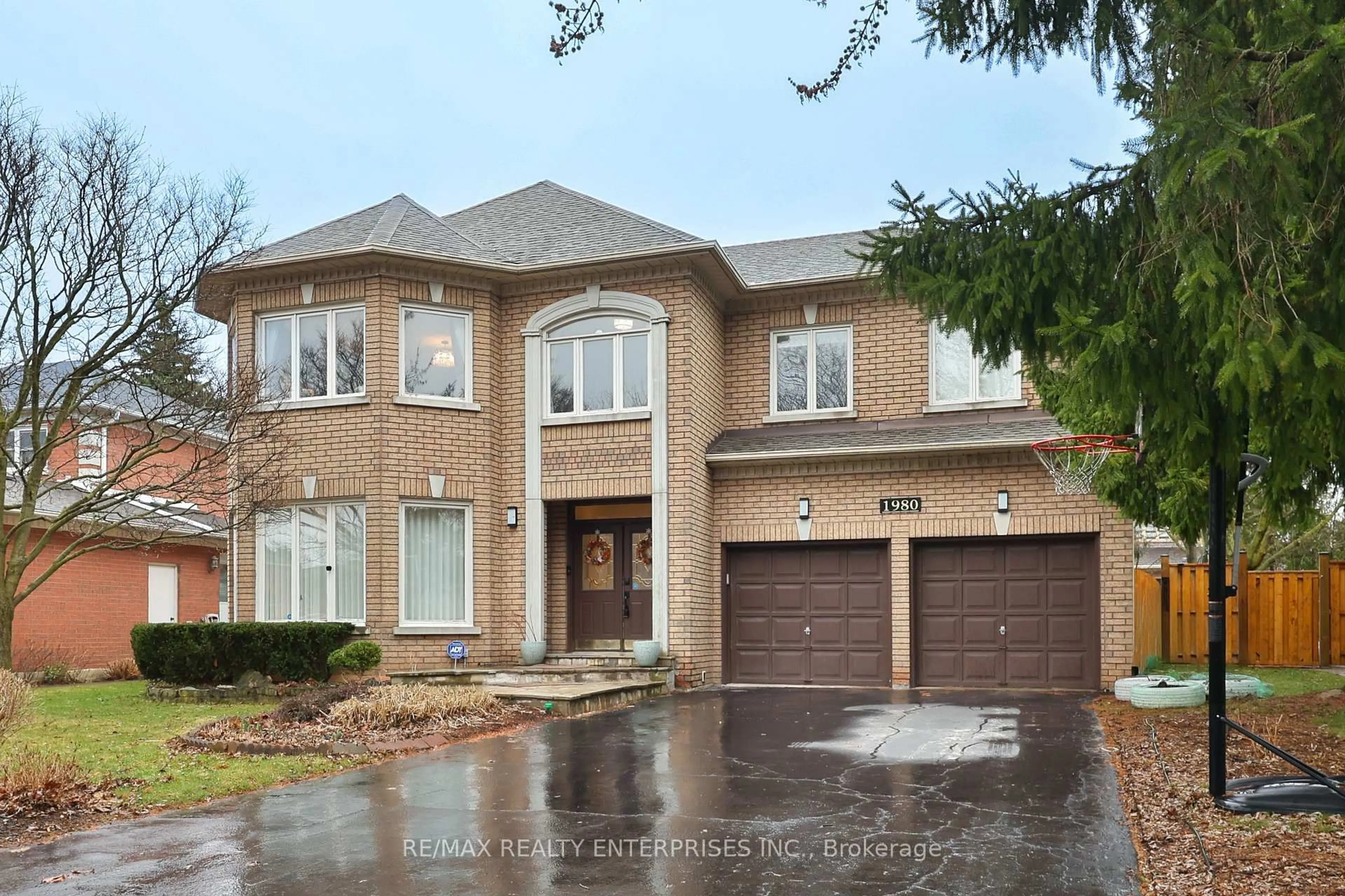 Home with brick exterior material, street for 1980 Calgary Crt, Mississauga Ontario L5H 4J1