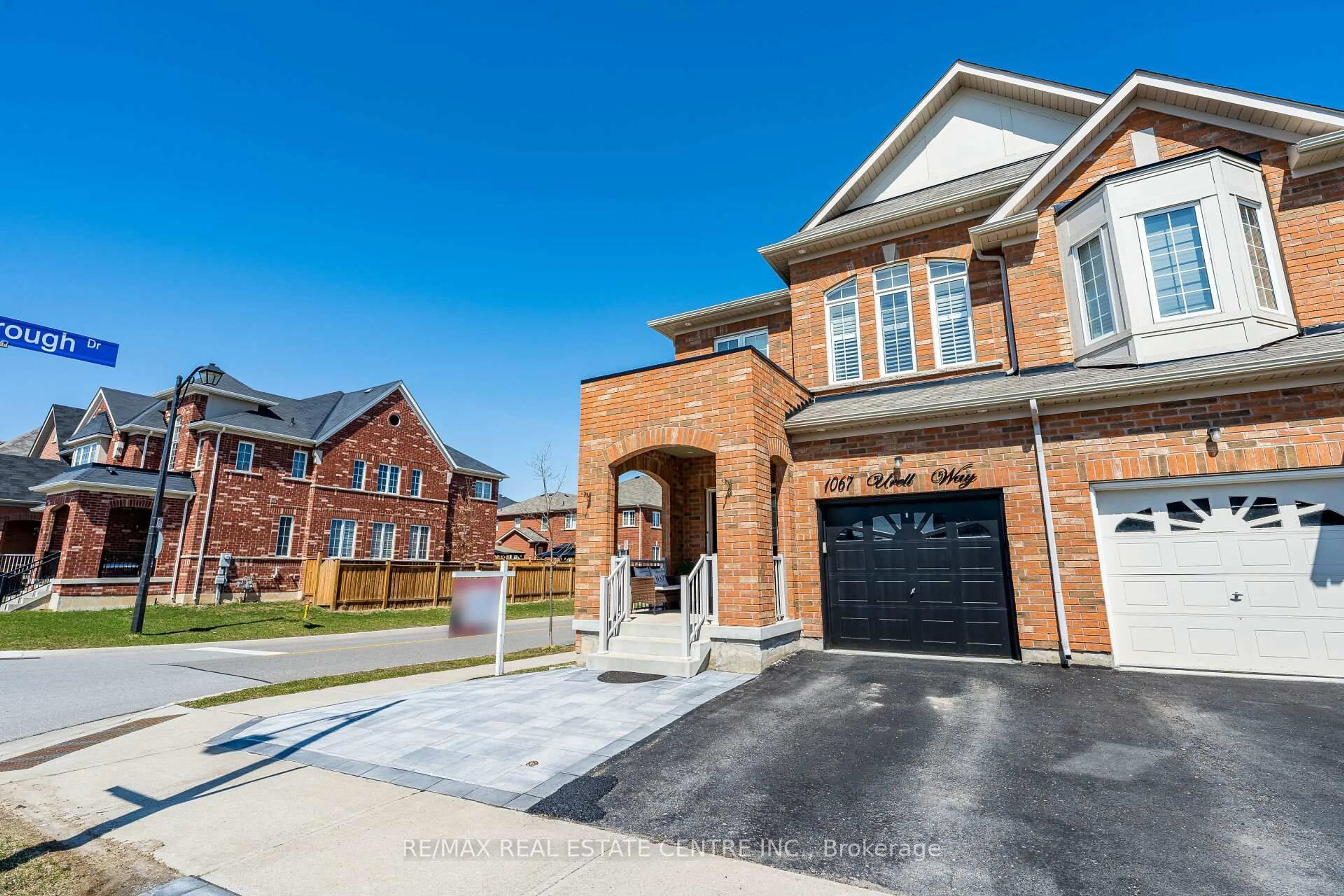 Home with brick exterior material, street for 1067 Urell Way, Milton Ontario L9T 8V5