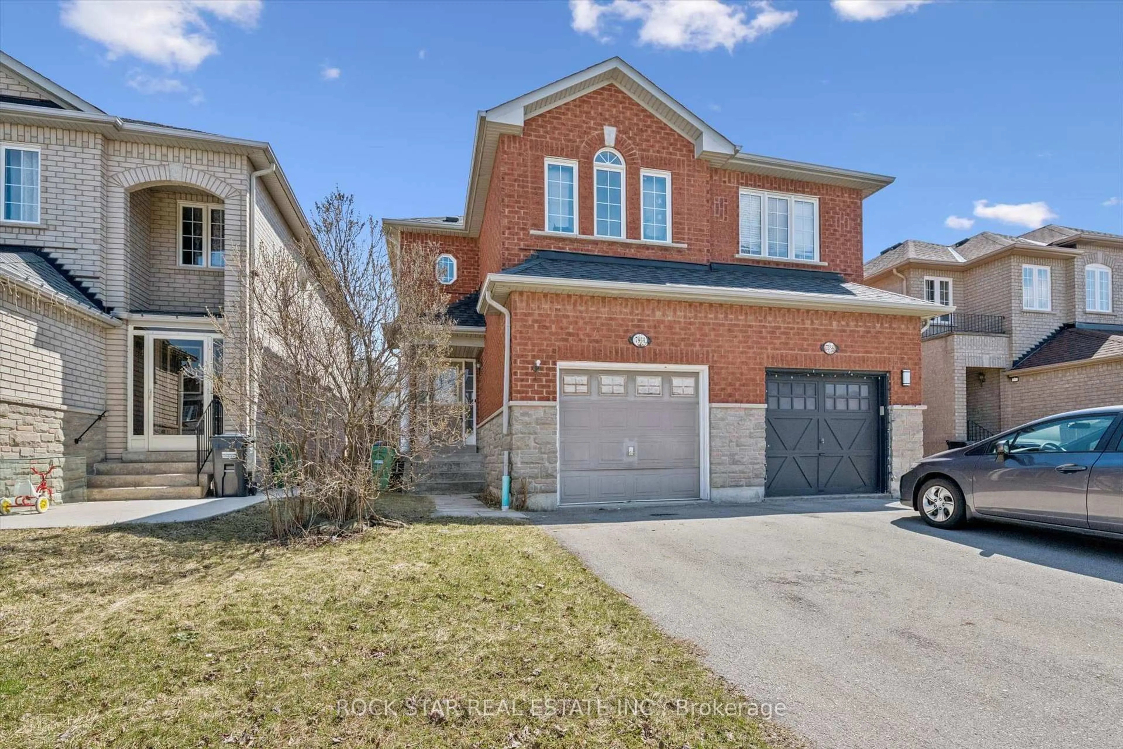 Home with brick exterior material, street for 7334 Lowville Hts, Mississauga Ontario L5N 8L4