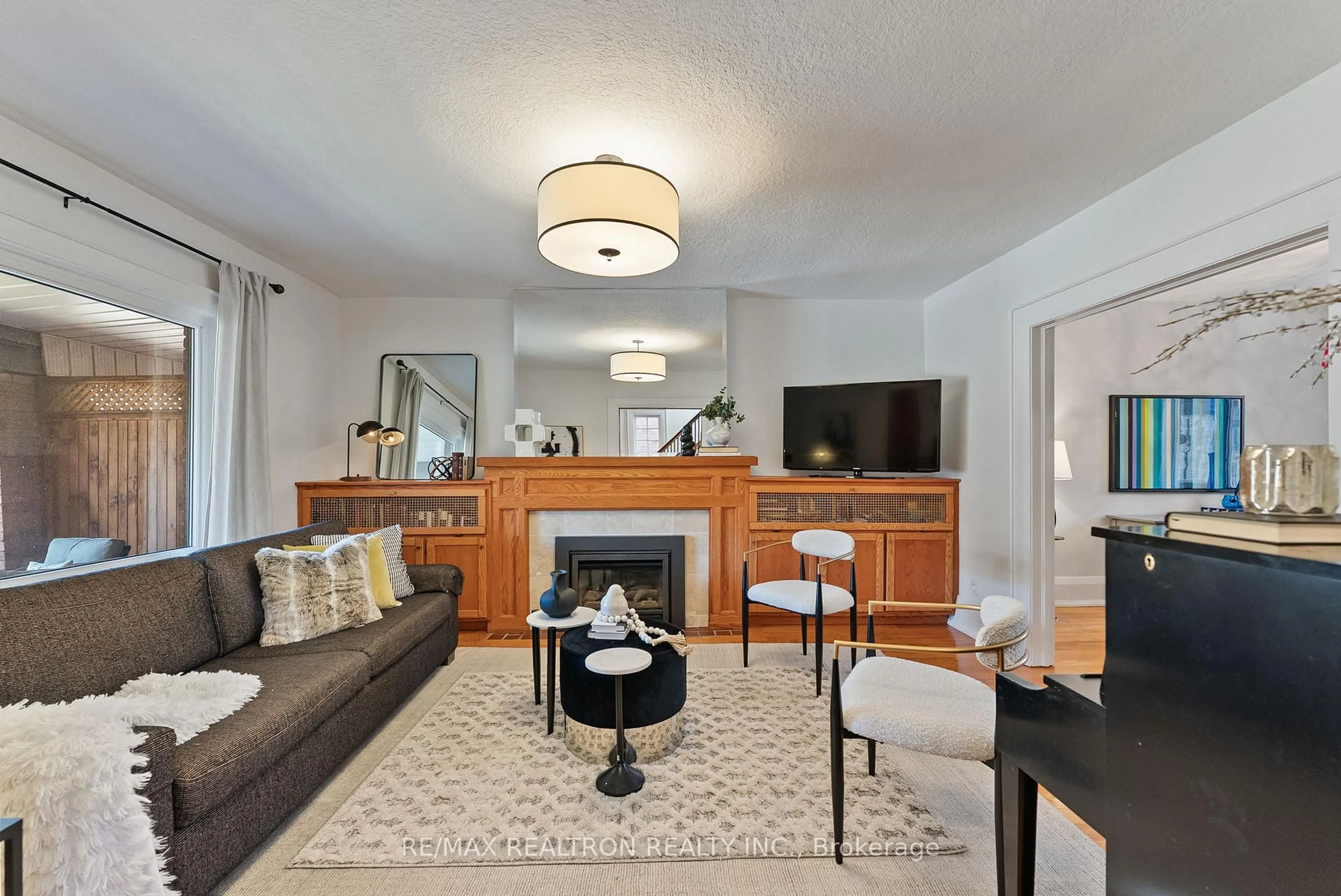 Living room with furniture, unknown for 105 Springmount Ave, Toronto Ontario M6H 2Y5