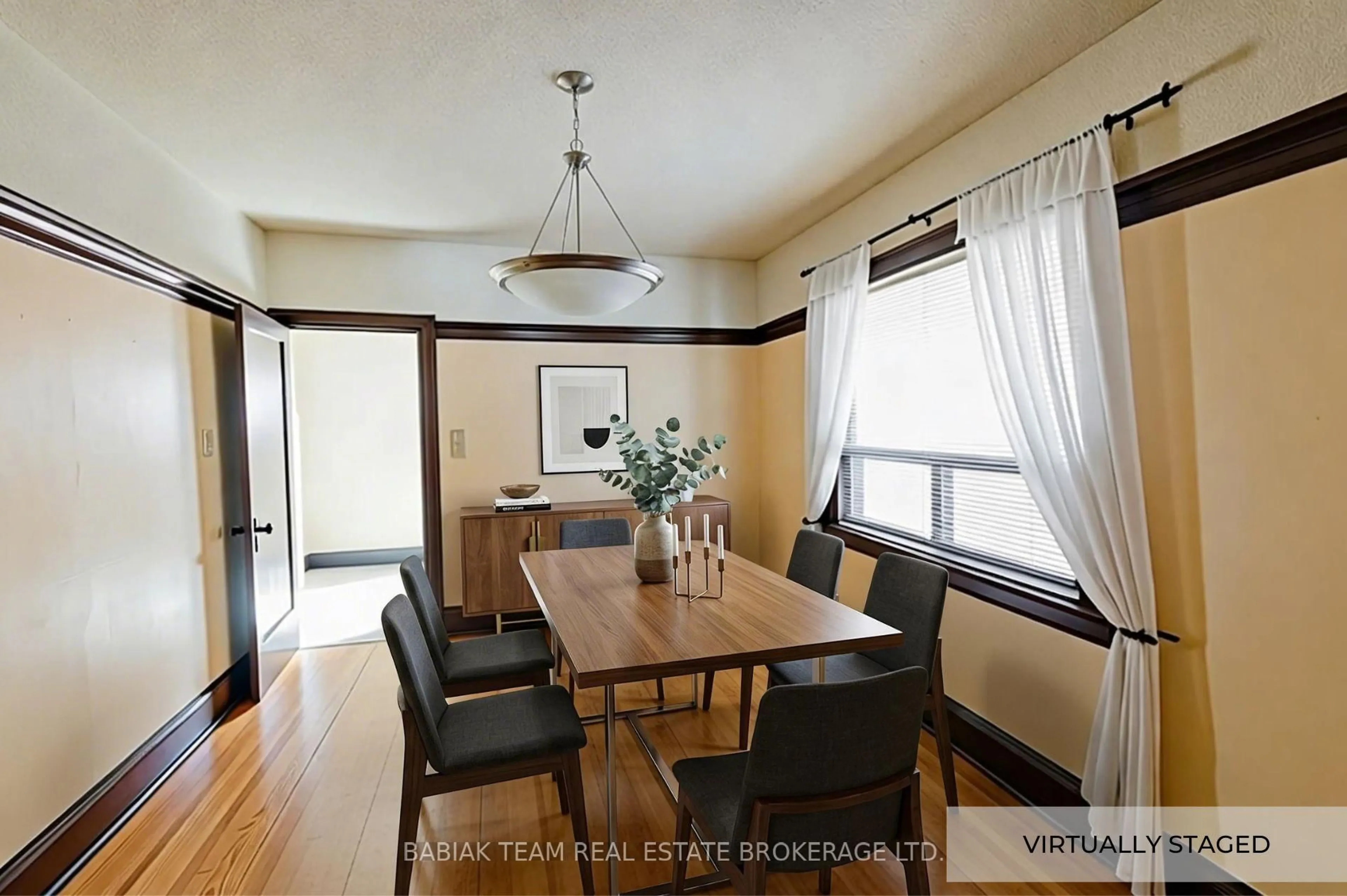 Dining room, wood/laminate floor for 31 Runnymede Rd, Toronto Ontario M6S 2Y1