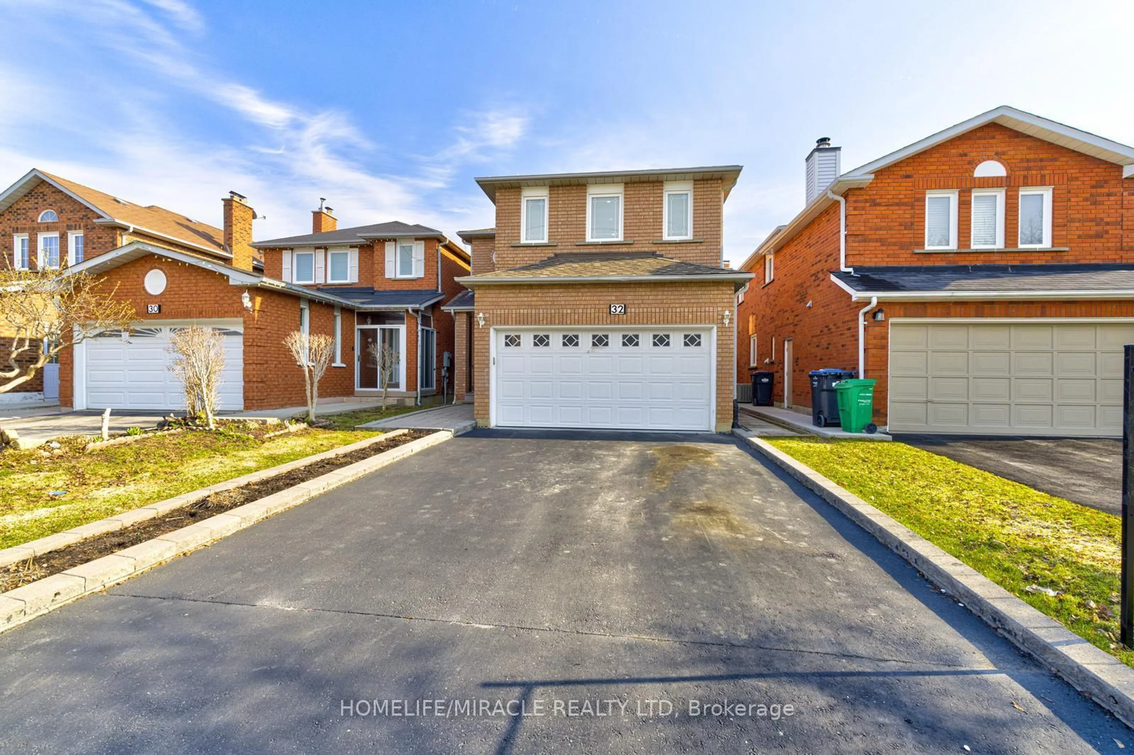 Home with brick exterior material, street for 32 Pennsylvania Ave, Brampton Ontario L6Y 4N7