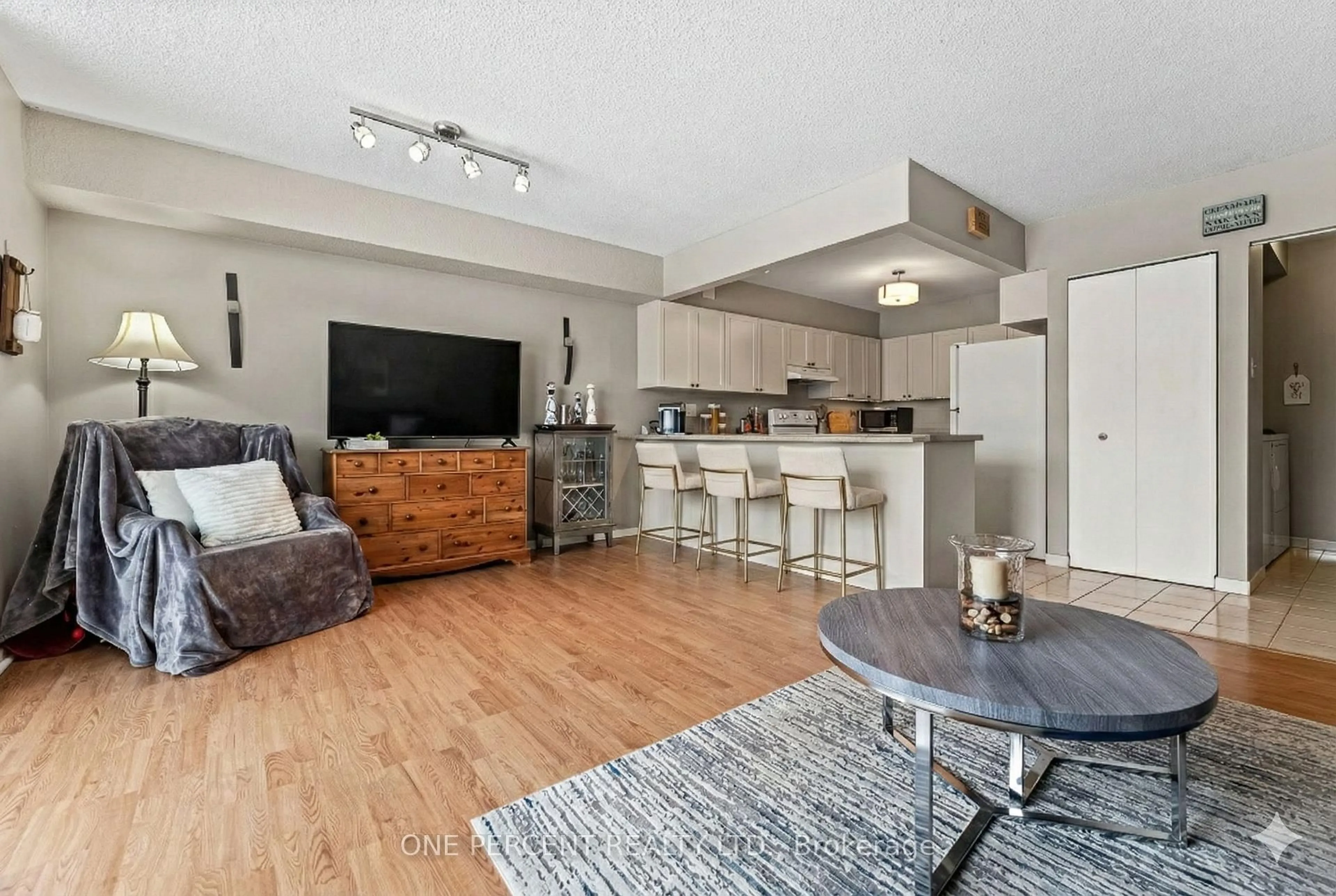 Open concept kitchen, wood/laminate floor for 16 Fourth St #25, Orangeville Ontario L9W 4N7