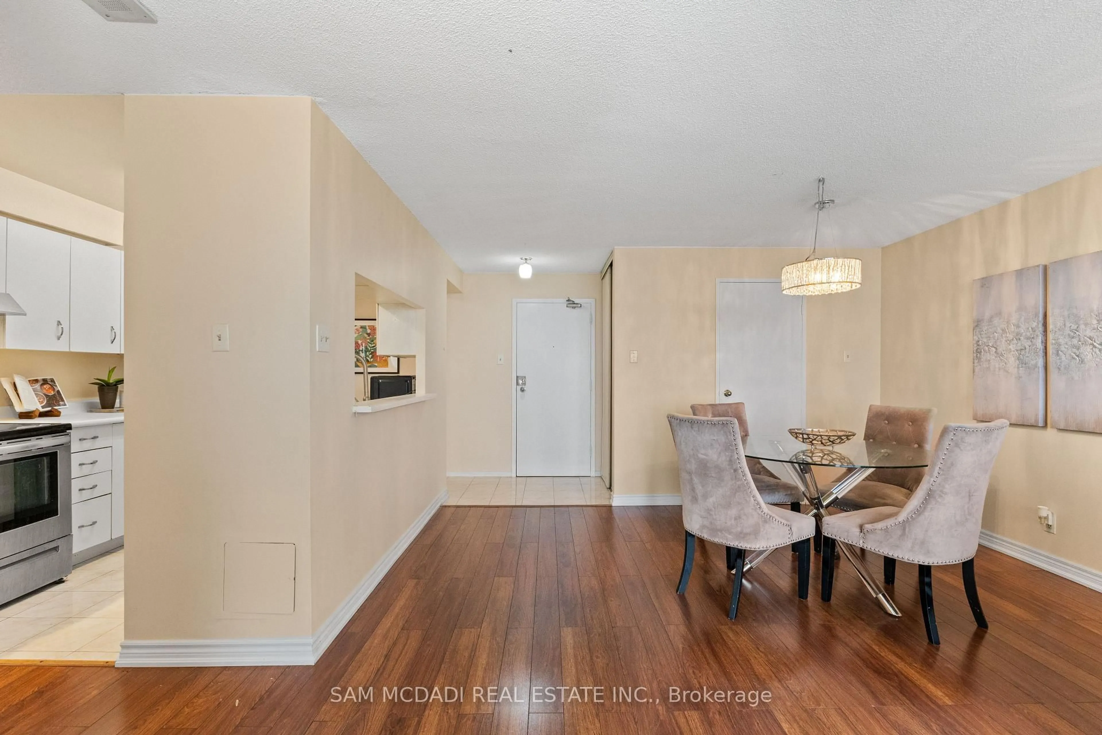 Dining room, wood/laminate floor for 35 Trailwood Dr #1013, Mississauga Ontario L4Z 3L6