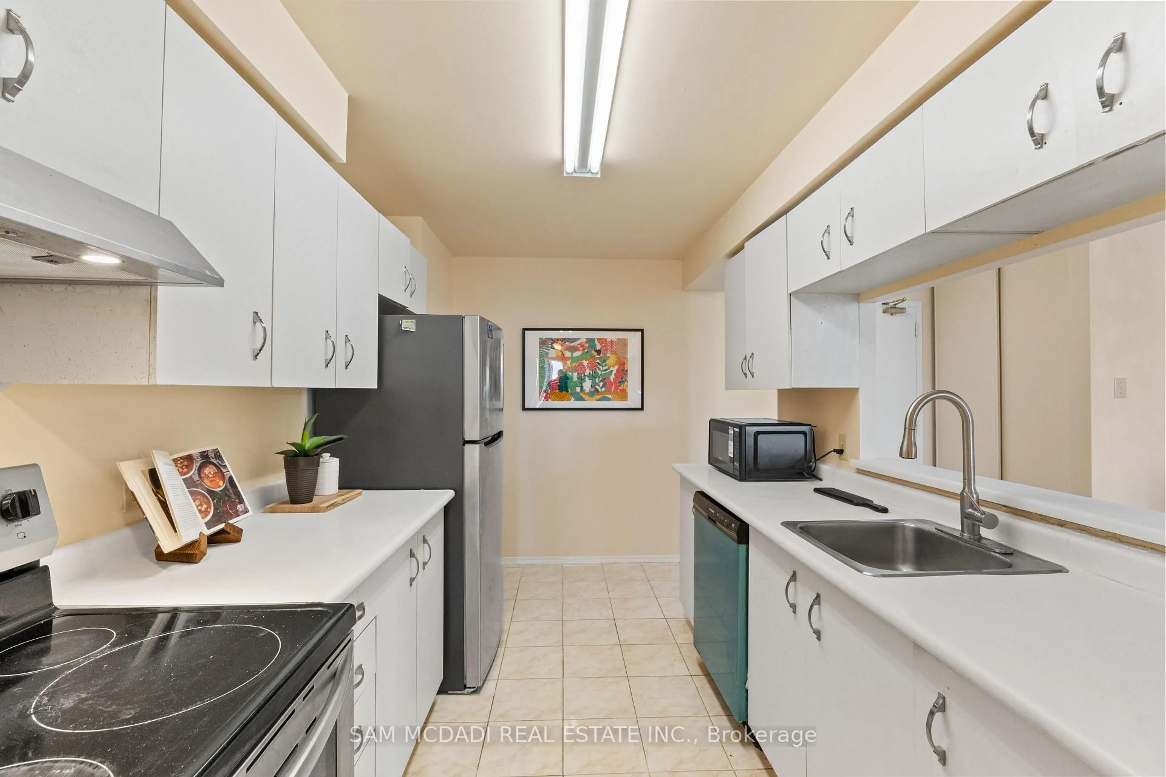 Standard kitchen, ceramic/tile floor for 35 Trailwood Dr #1013, Mississauga Ontario L4Z 3L6