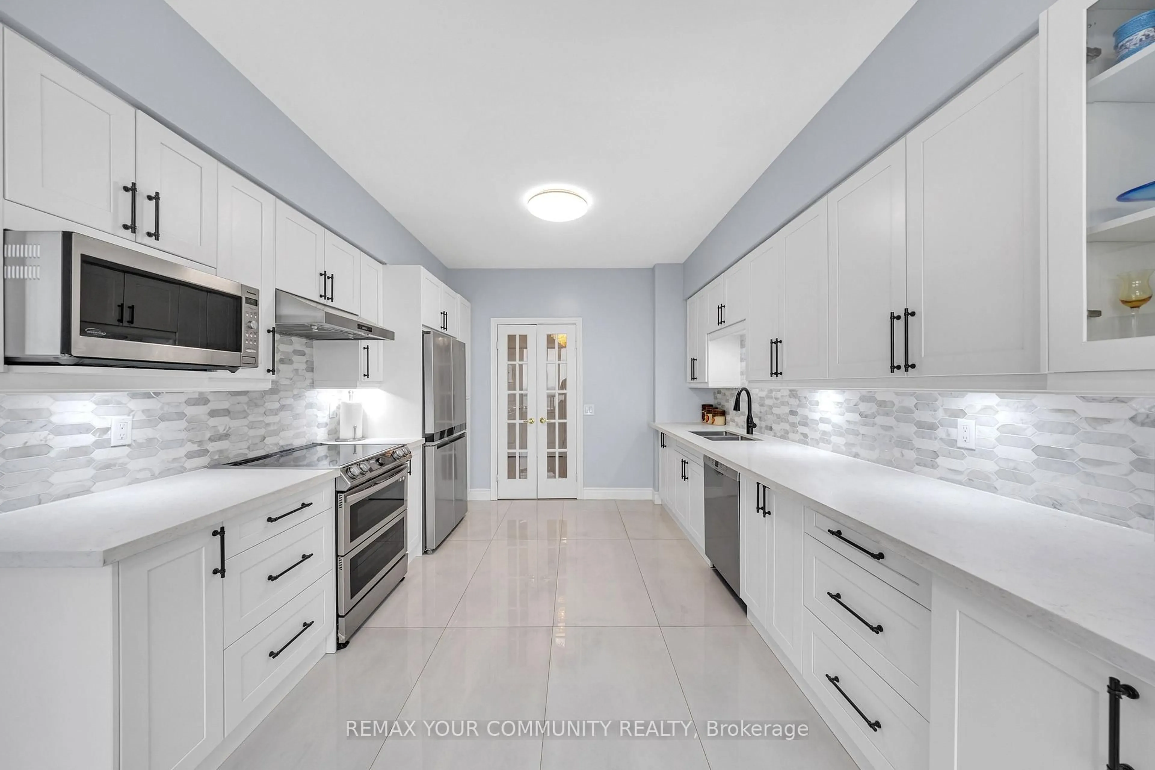 Contemporary kitchen, ceramic/tile floor for 35 Kingsbridge Garden Circ #3005, Mississauga Ontario L5R 3Z5