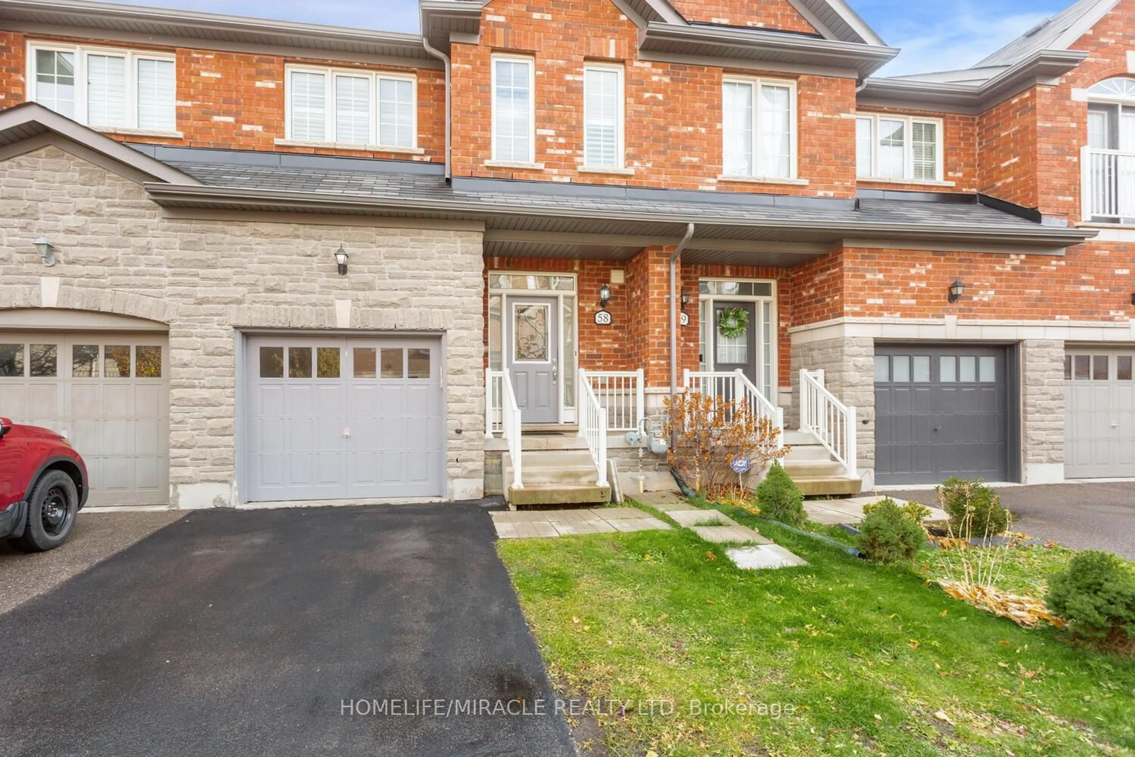 Home with brick exterior material, street for 745 Farmstead Dr #58, Milton Ontario L9T 8B2