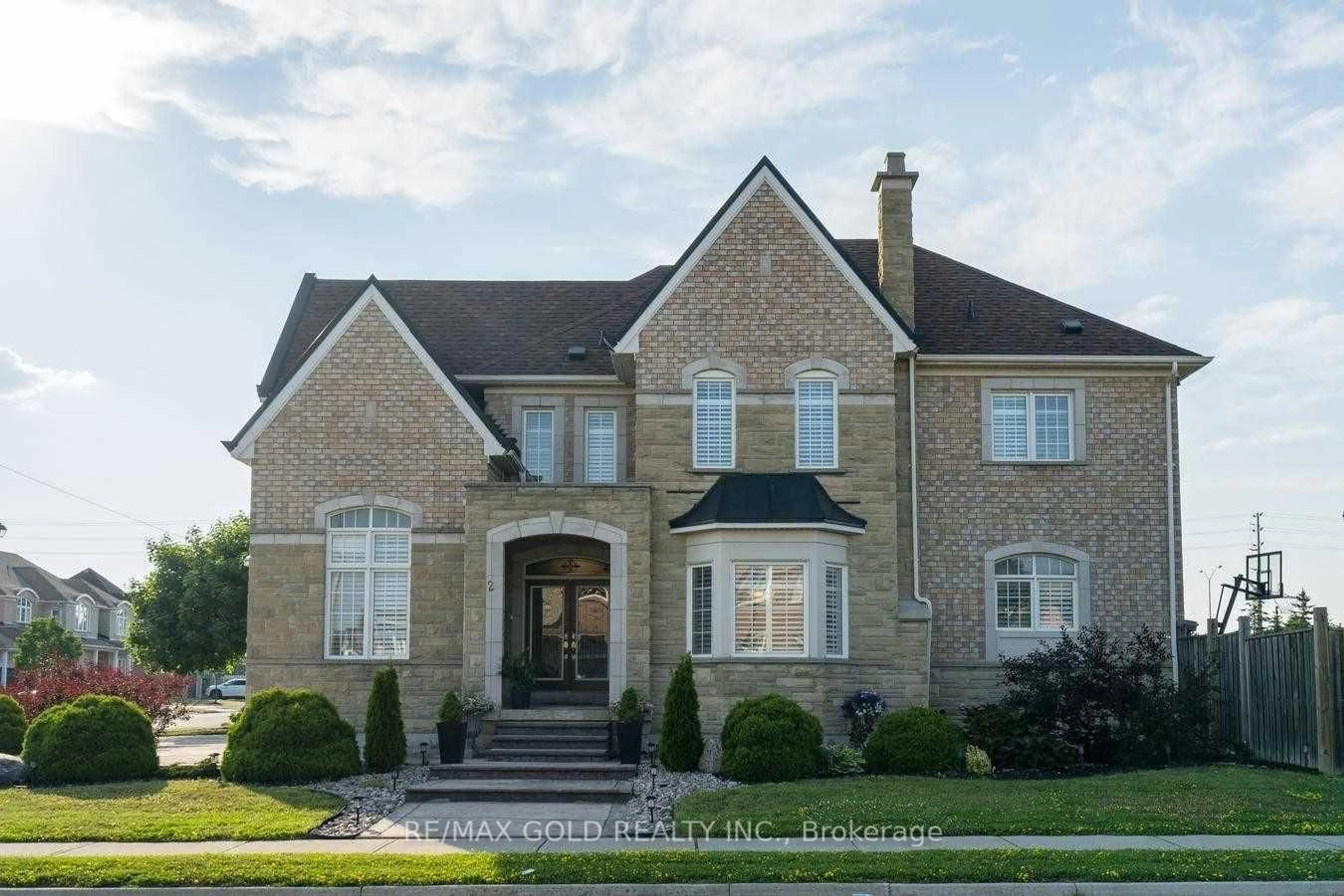 Home with brick exterior material, street for 2 Calderstone Rd, Brampton Ontario L6P 2A4