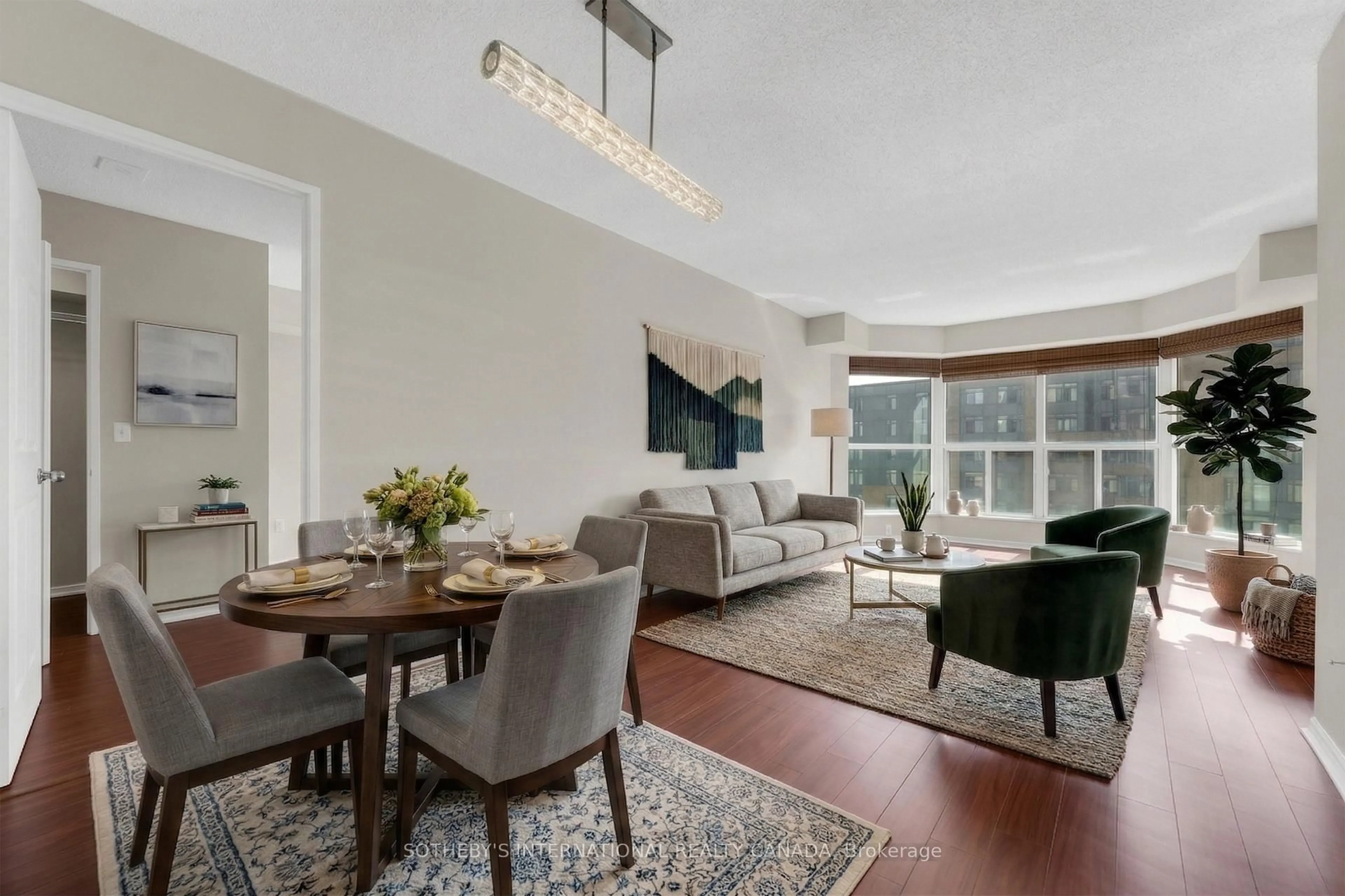 Living room with furniture, unknown for 325 Webb Dr #1411, Mississauga Ontario L5B 3Z9