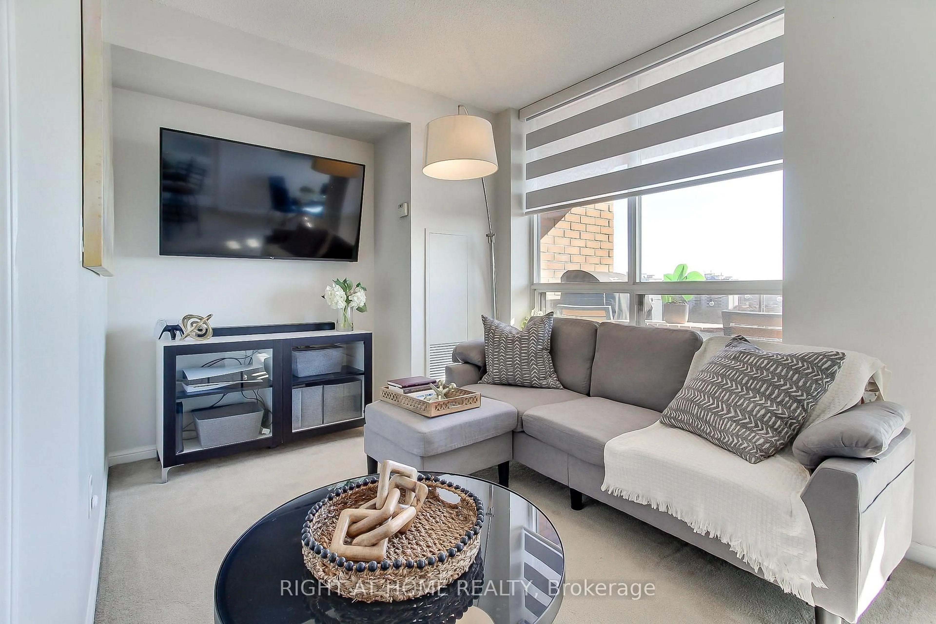 Living room with furniture, unknown for 1140 Parkwest Pl #1002, Mississauga Ontario L5E 3K9