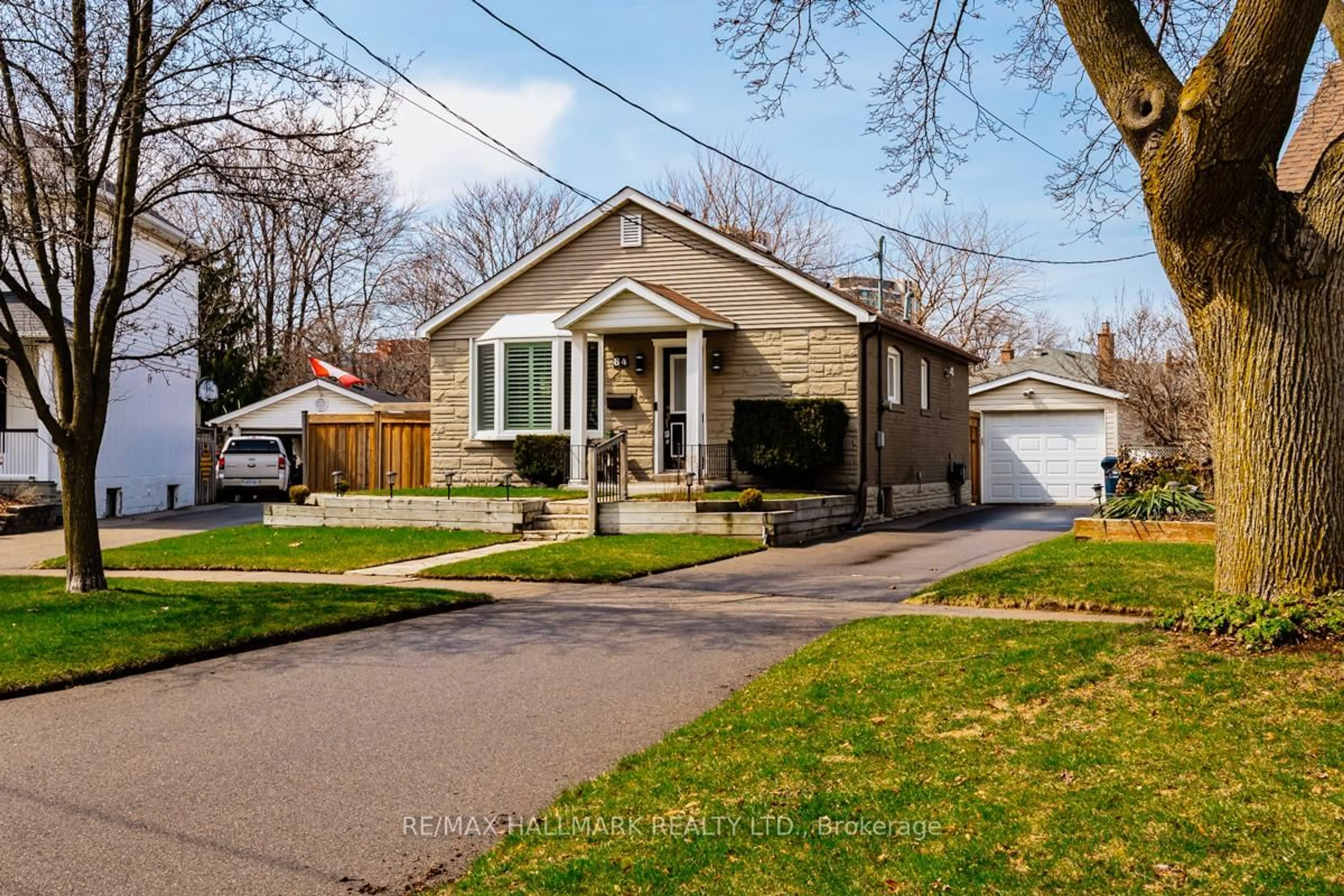 Home with brick exterior material, street for 84 Delma Dr, Toronto Ontario M8W 4P1