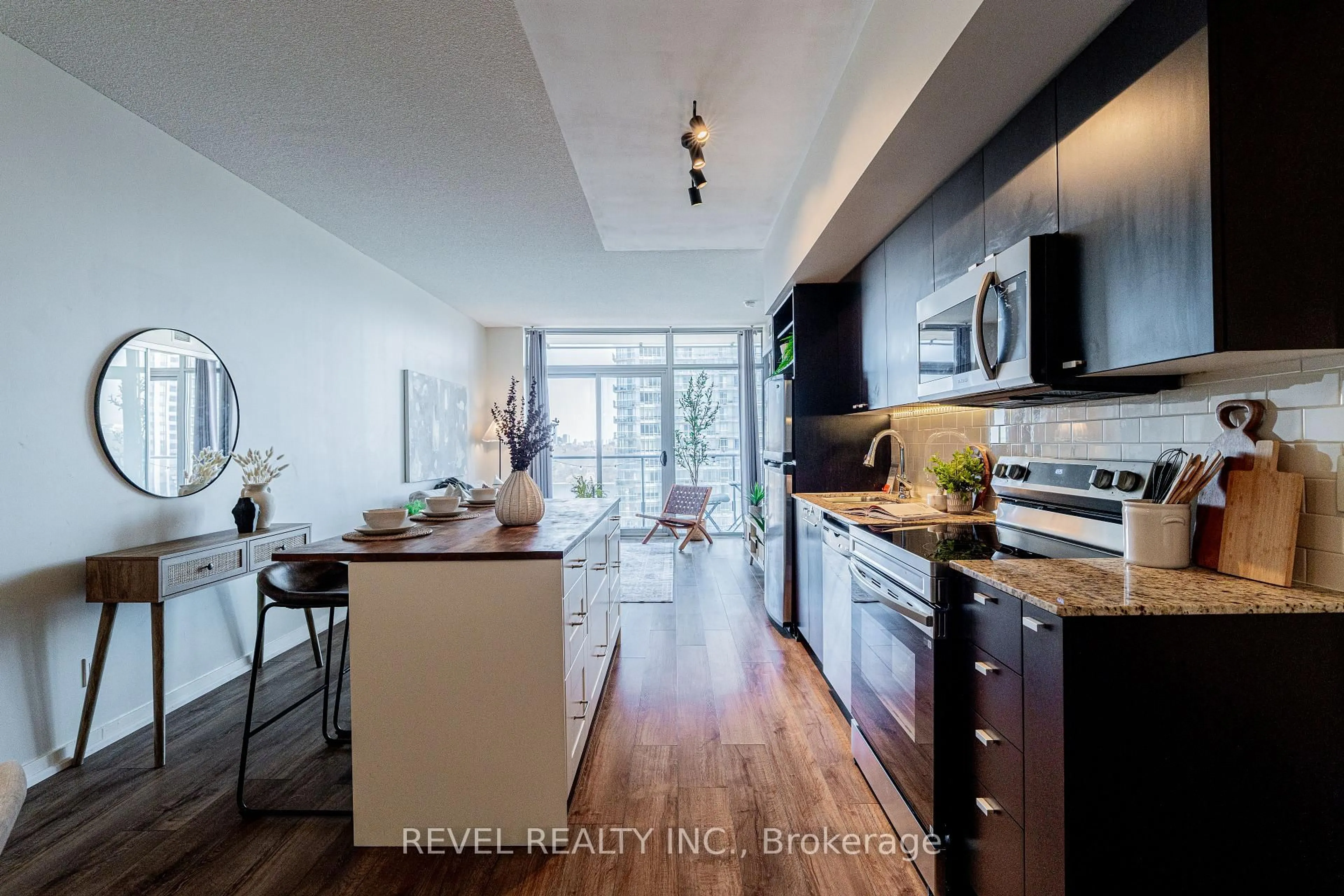 Open concept kitchen, wood/laminate floor for 103 The Queensway Ave #1616, Toronto Ontario M6S 5B3