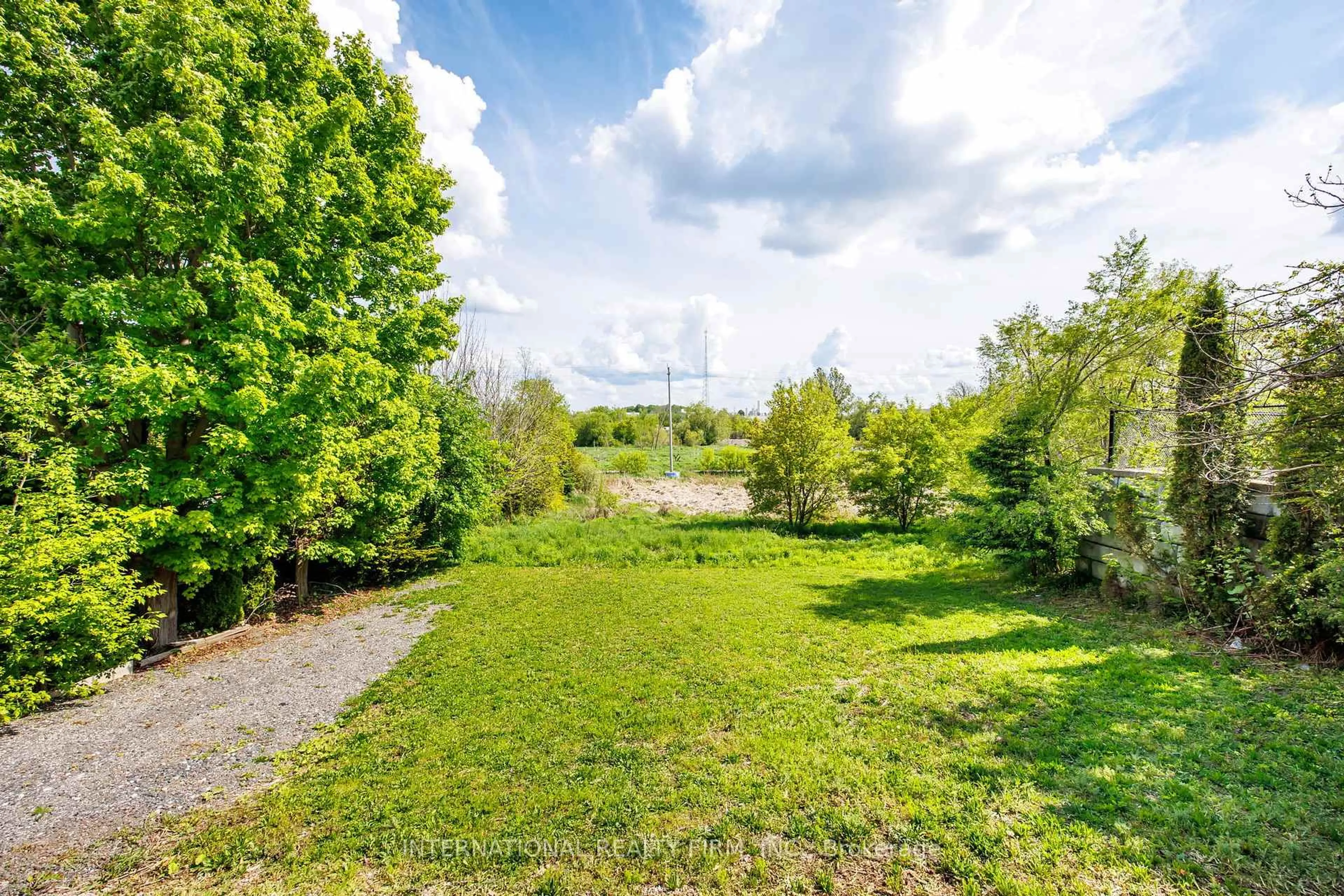 A pic from outside/outdoor area/front of a property/back of a property/a pic from drone, forest/trees view for 304 Broadway, Orangeville Ontario L9W 1L3