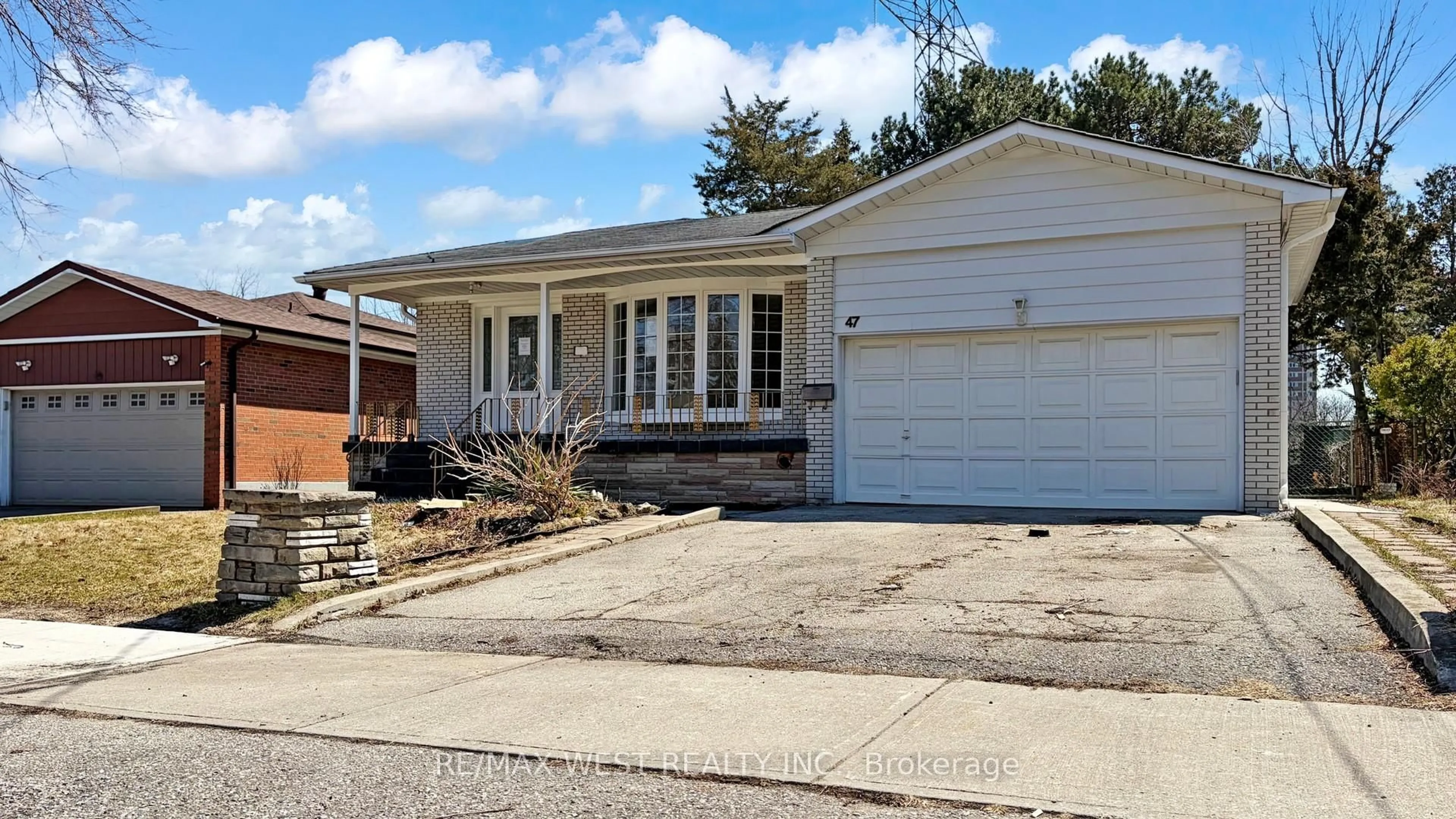 Home with vinyl exterior material, street for 47 Tobermory Dr, Toronto Ontario M3N 2R4