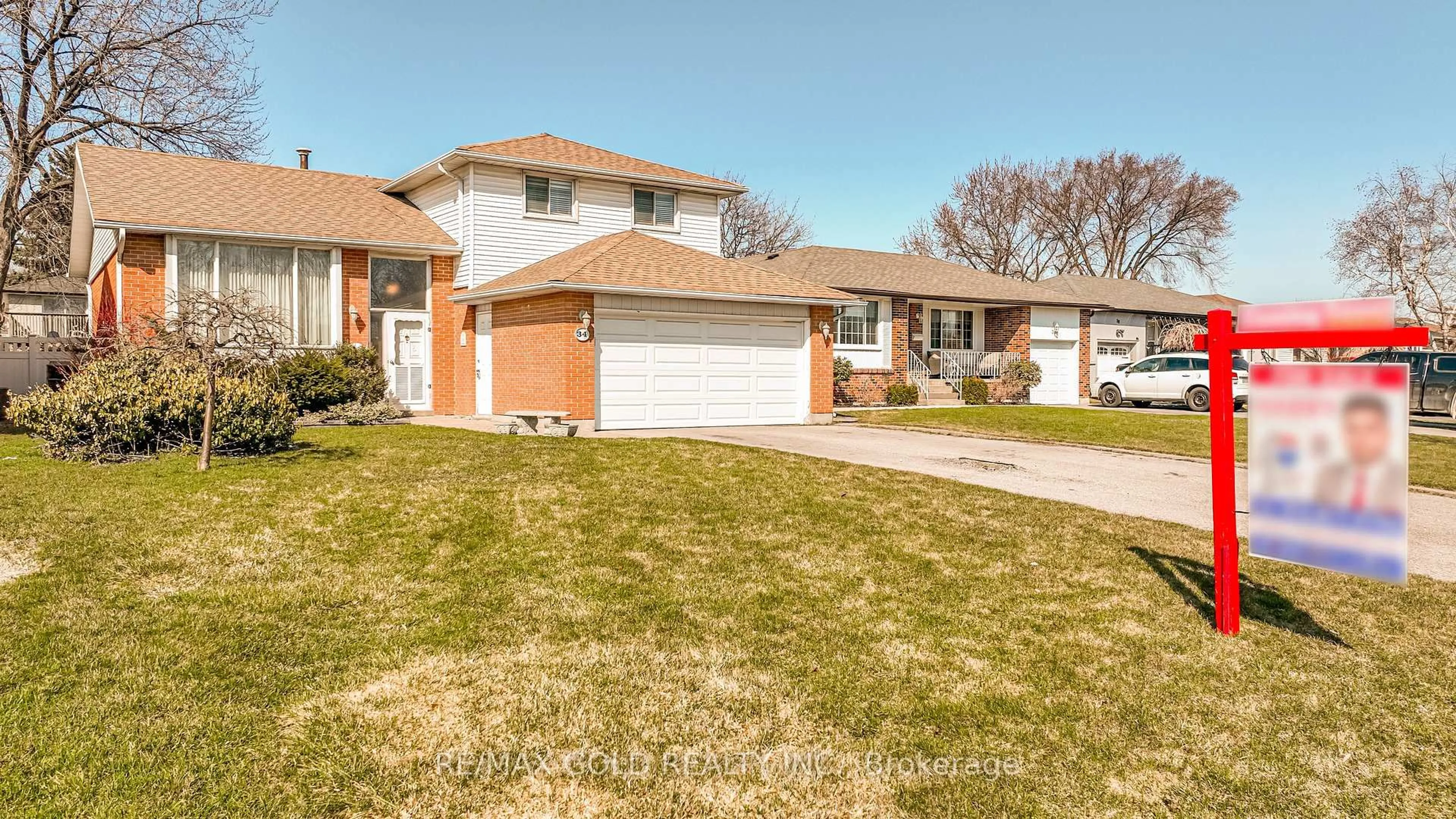 Home with brick exterior material, street for 34 Deerfield Cres, Brampton Ontario L6T 1K7