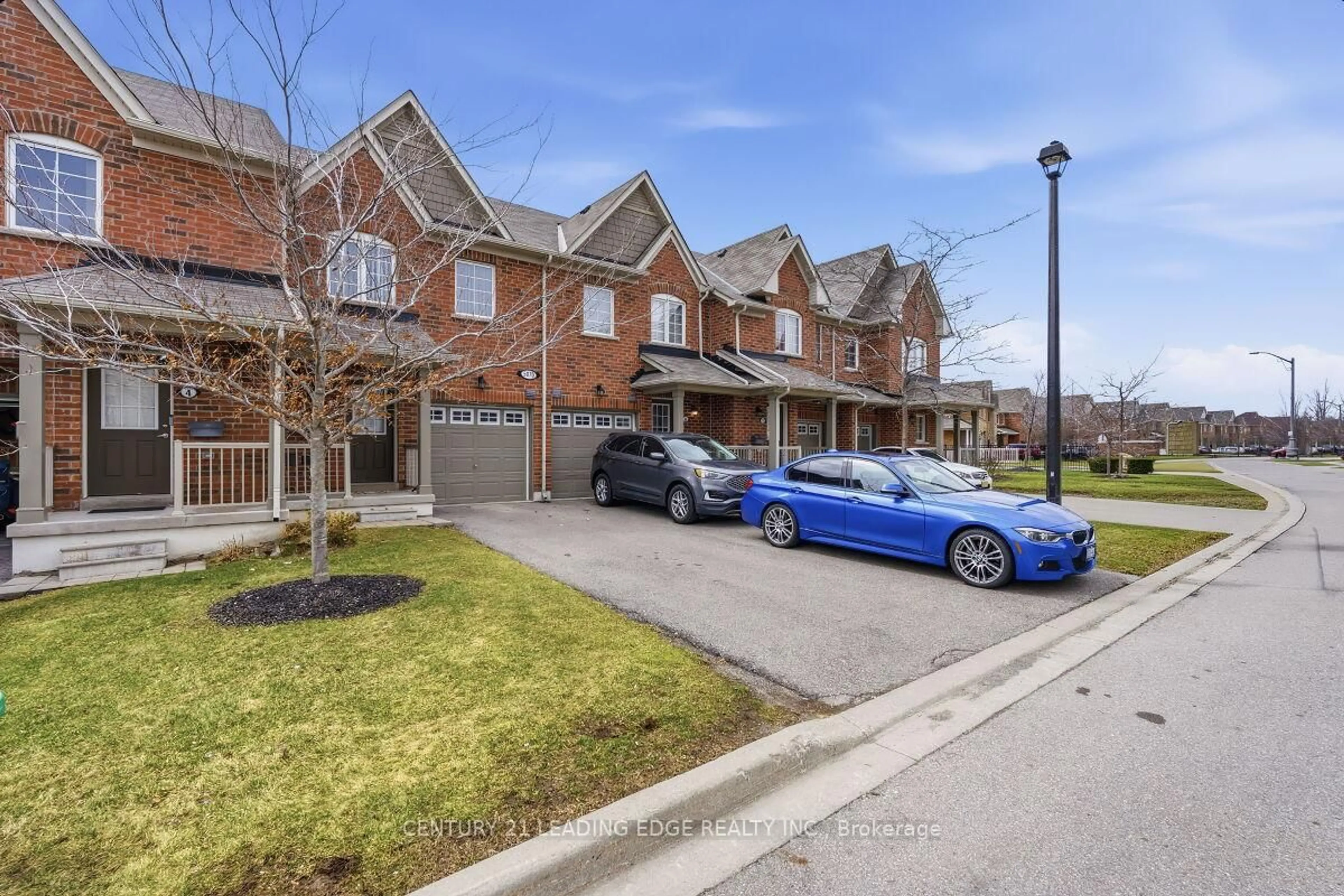 A pic from outside/outdoor area/front of a property/back of a property/a pic from drone, street for 5070 Harvard Rd #5, Mississauga Ontario L5M 0X1