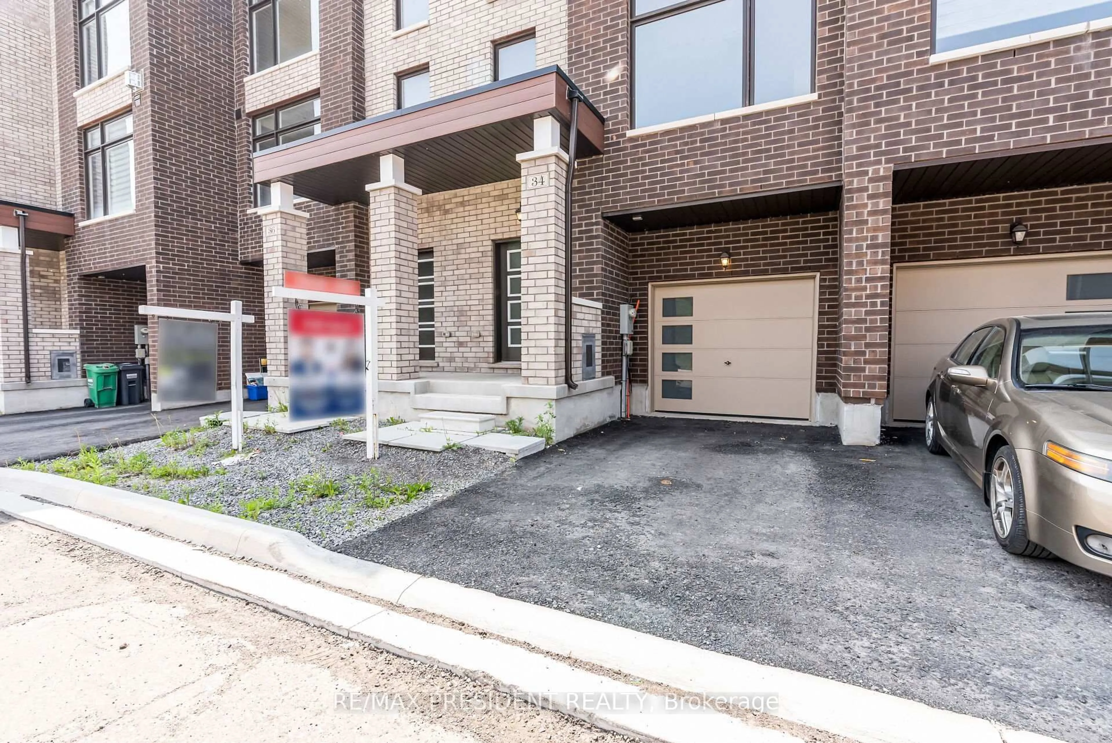 Home with brick exterior material, street for 34 Queenpost Dr, Brampton Ontario L6Y 6L2