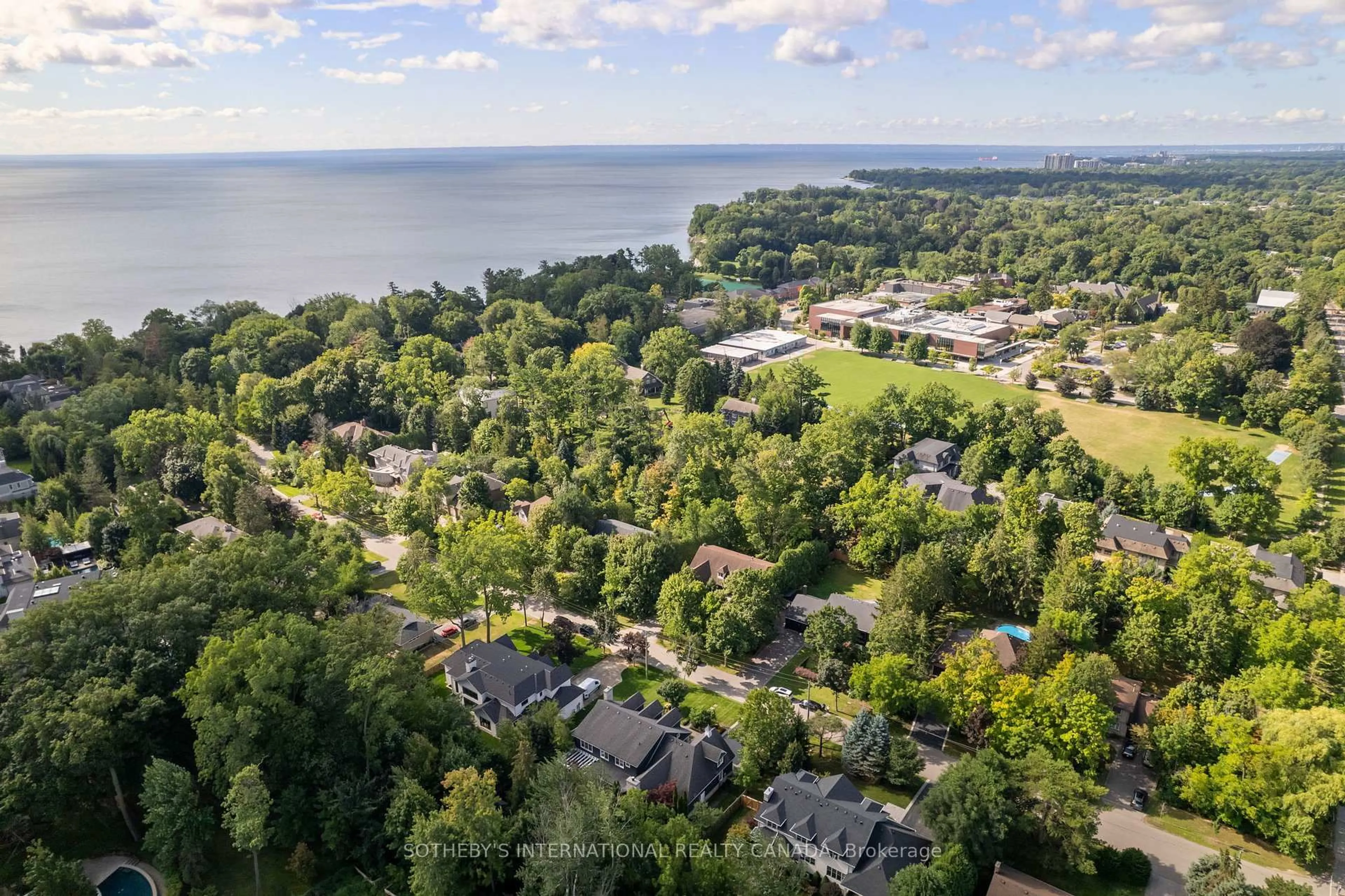 A pic from outside/outdoor area/front of a property/back of a property/a pic from drone, water/lake/river/ocean view for 79 Birch Hill Lane, Oakville Ontario L6K 2P1