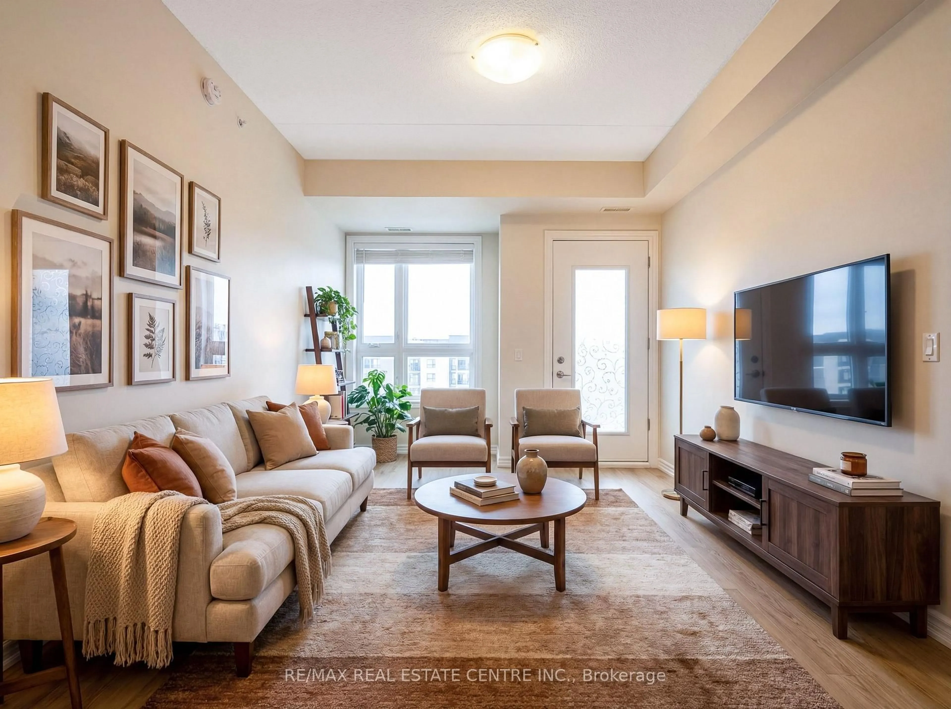 Living room with furniture, unknown for 650 Sauve St #408, Milton Ontario L9T 9A8