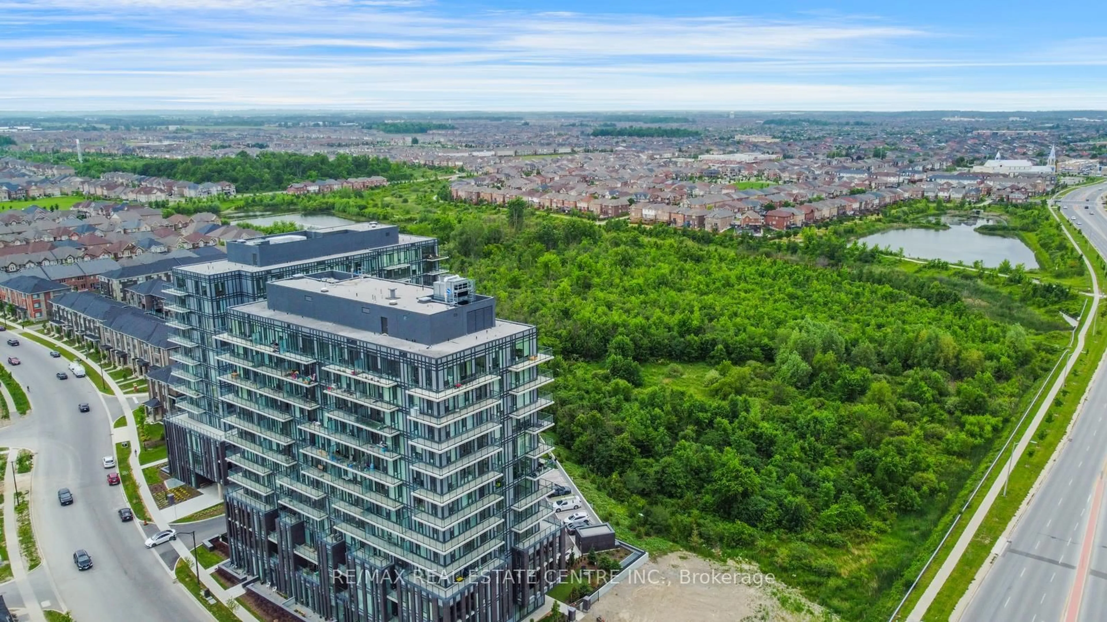 A pic from outside/outdoor area/front of a property/back of a property/a pic from drone, city buildings view from balcony for 215 Veterans Dr #202, Brampton Ontario L7A 4S6