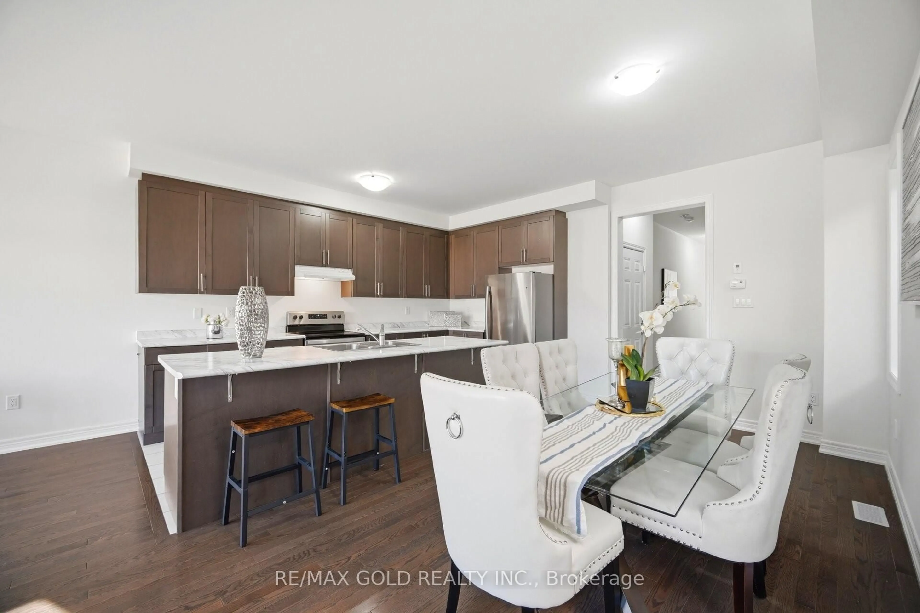 Open concept kitchen, wood/laminate floor for 145 Adventura Rd, Brampton Ontario L7A 5A7