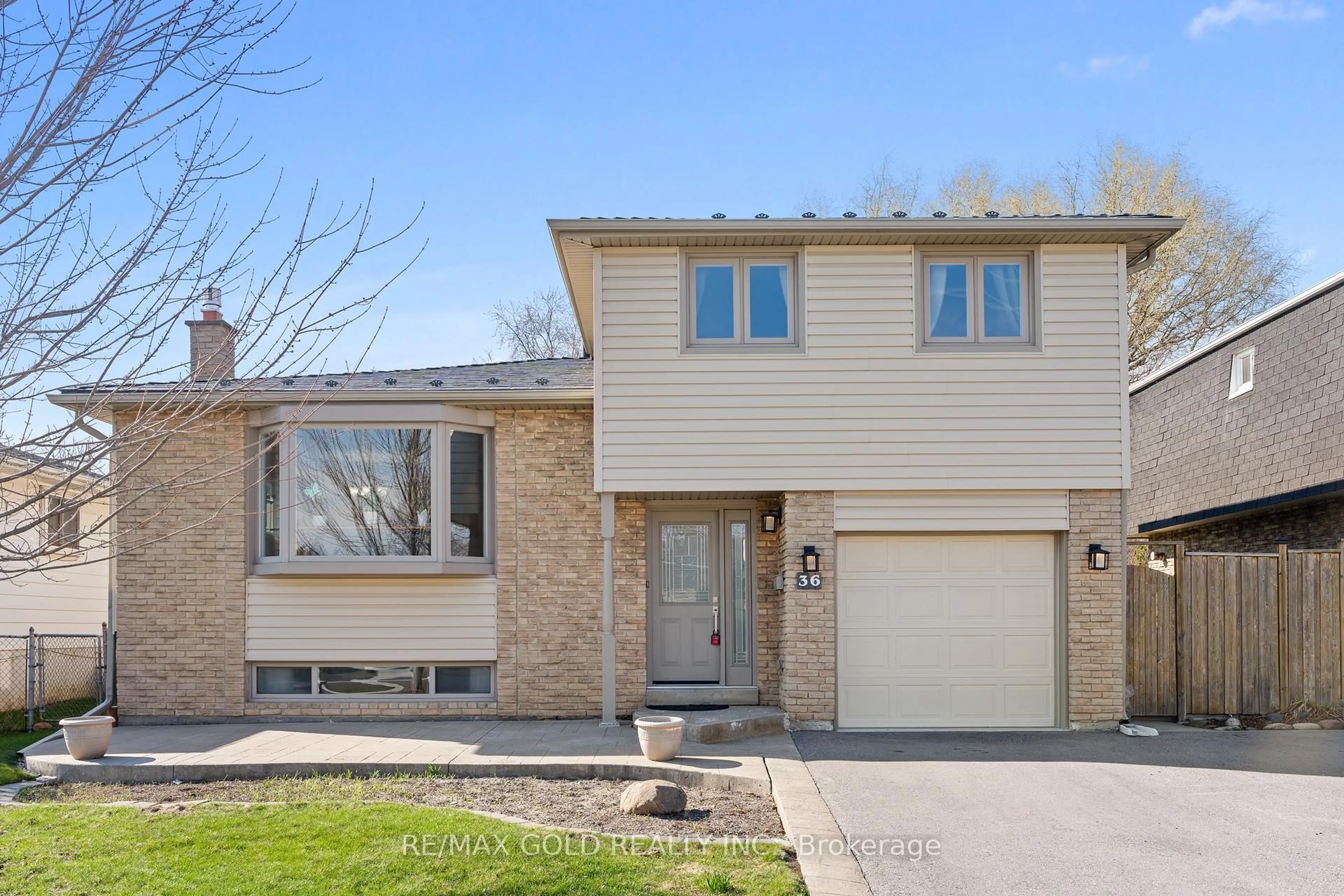 Home with brick exterior material, street for 36 Greenmount Rd, Brampton Ontario L6S 1L5