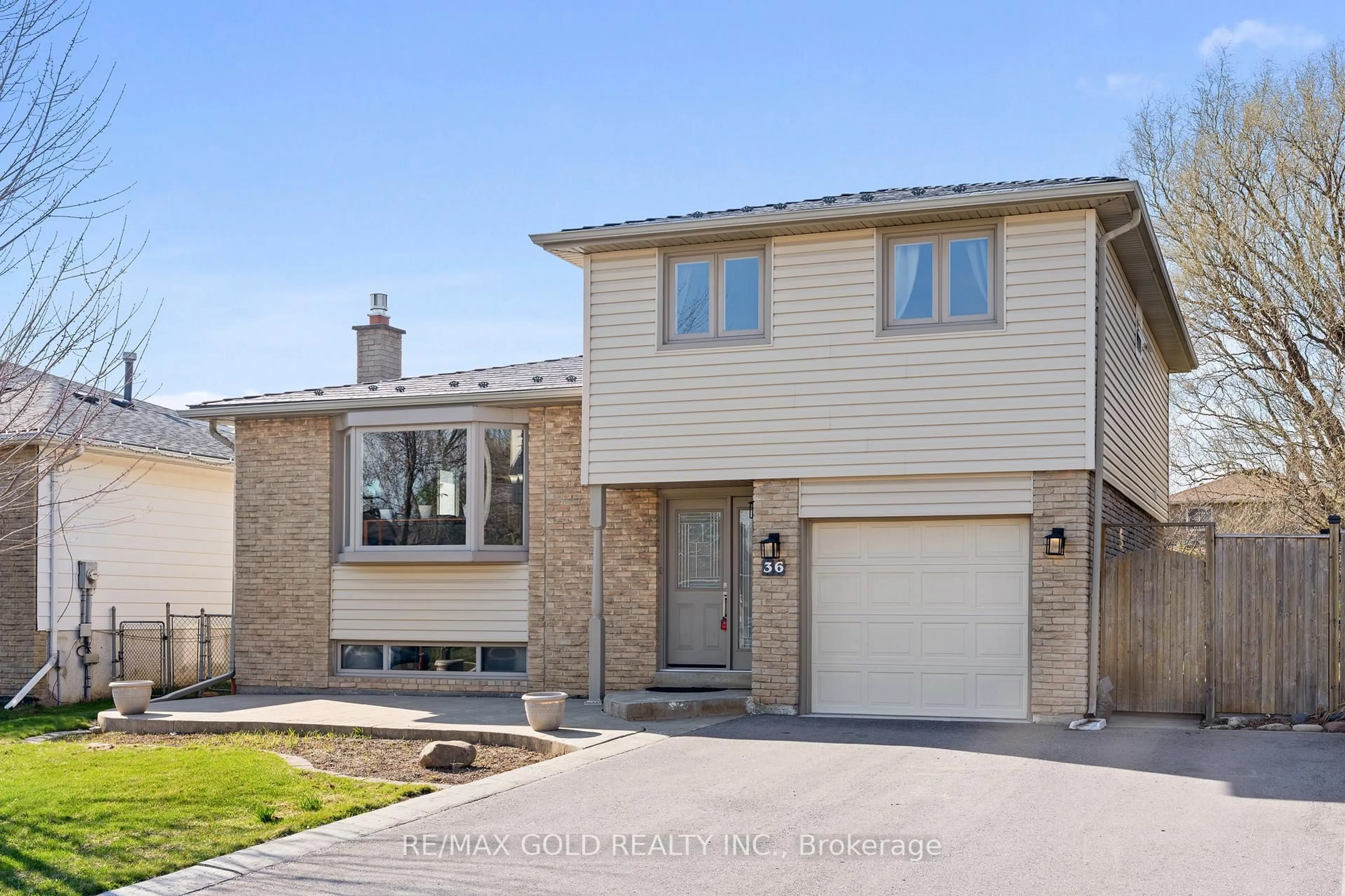 Home with brick exterior material, street for 36 Greenmount Rd, Brampton Ontario L6S 1L5
