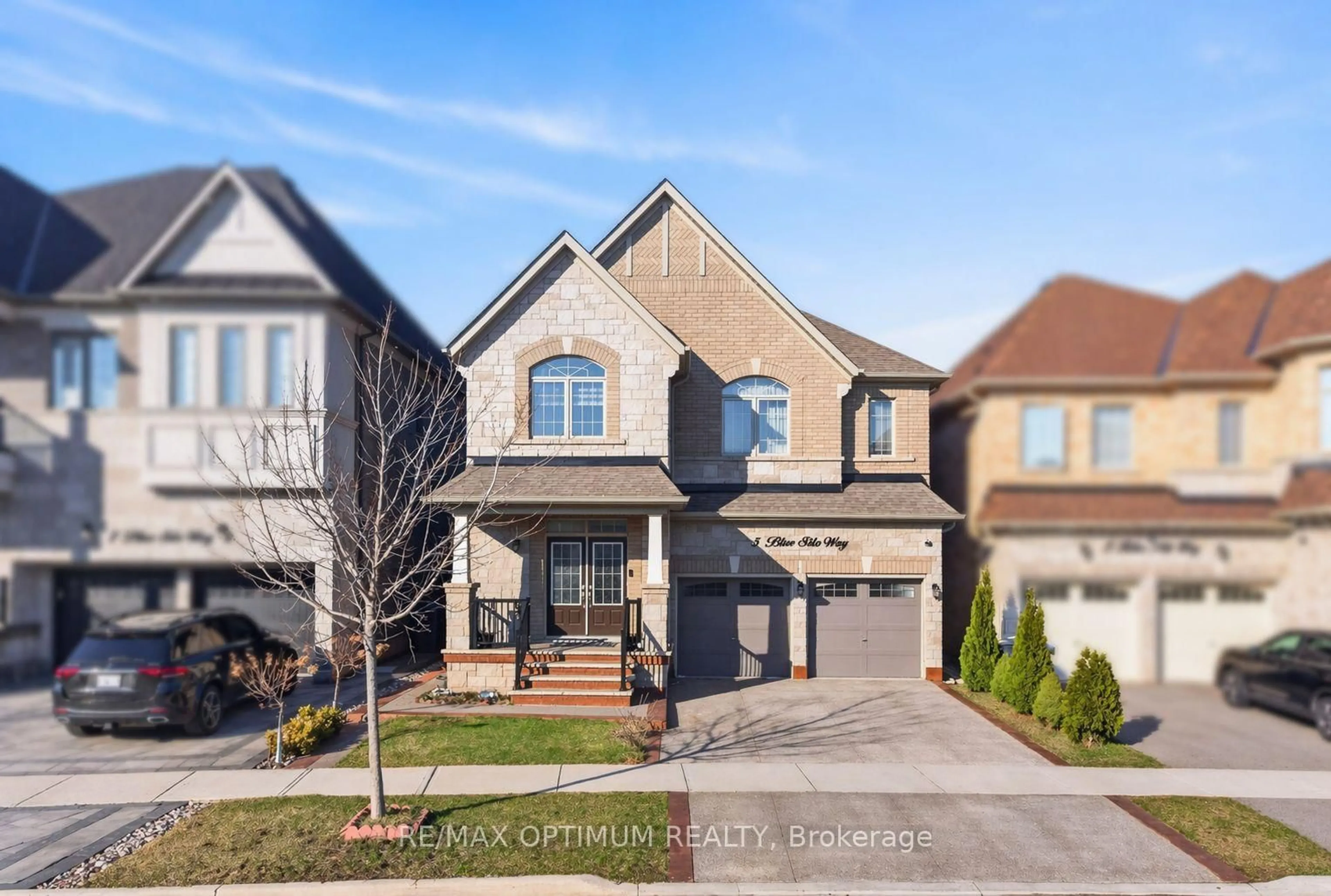 Home with brick exterior material, street for 5 Blue Silo Way, Brampton Ontario L6X 5P5