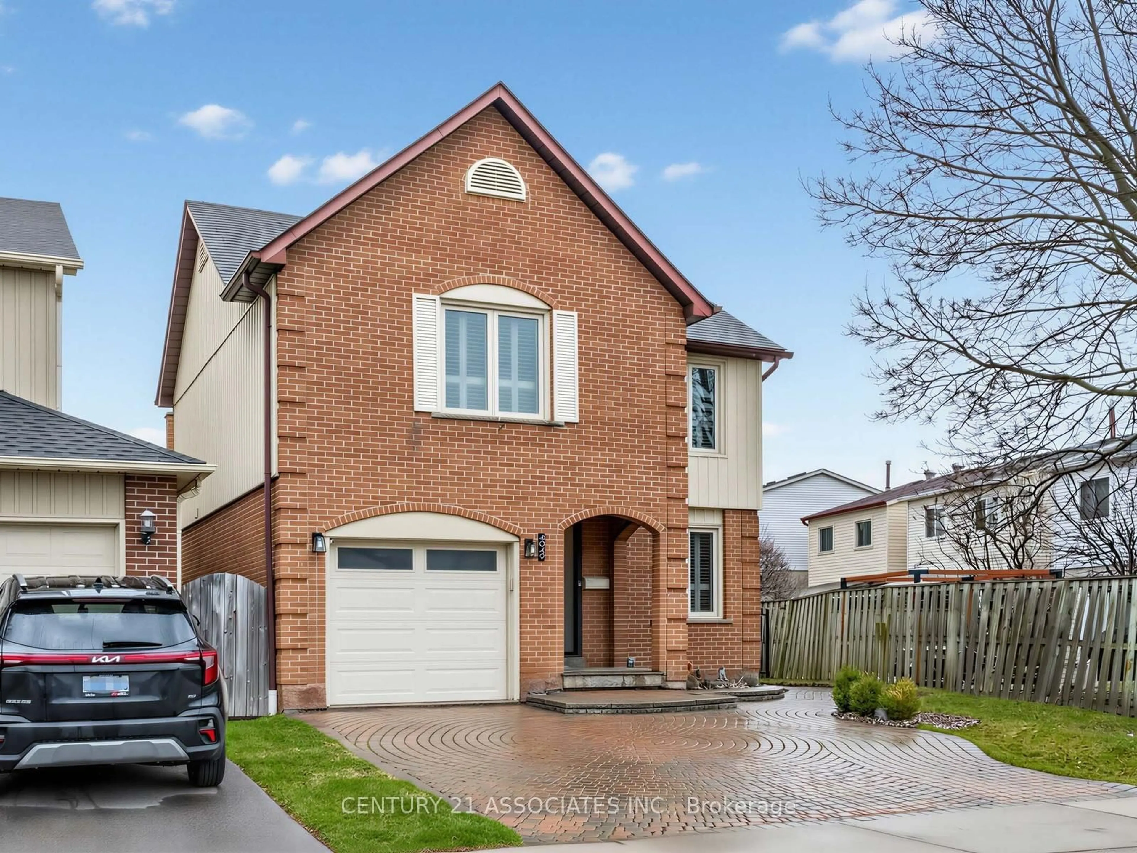 Home with brick exterior material, street for 4049 Teakwood Dr, Mississauga Ontario L5C 3L2