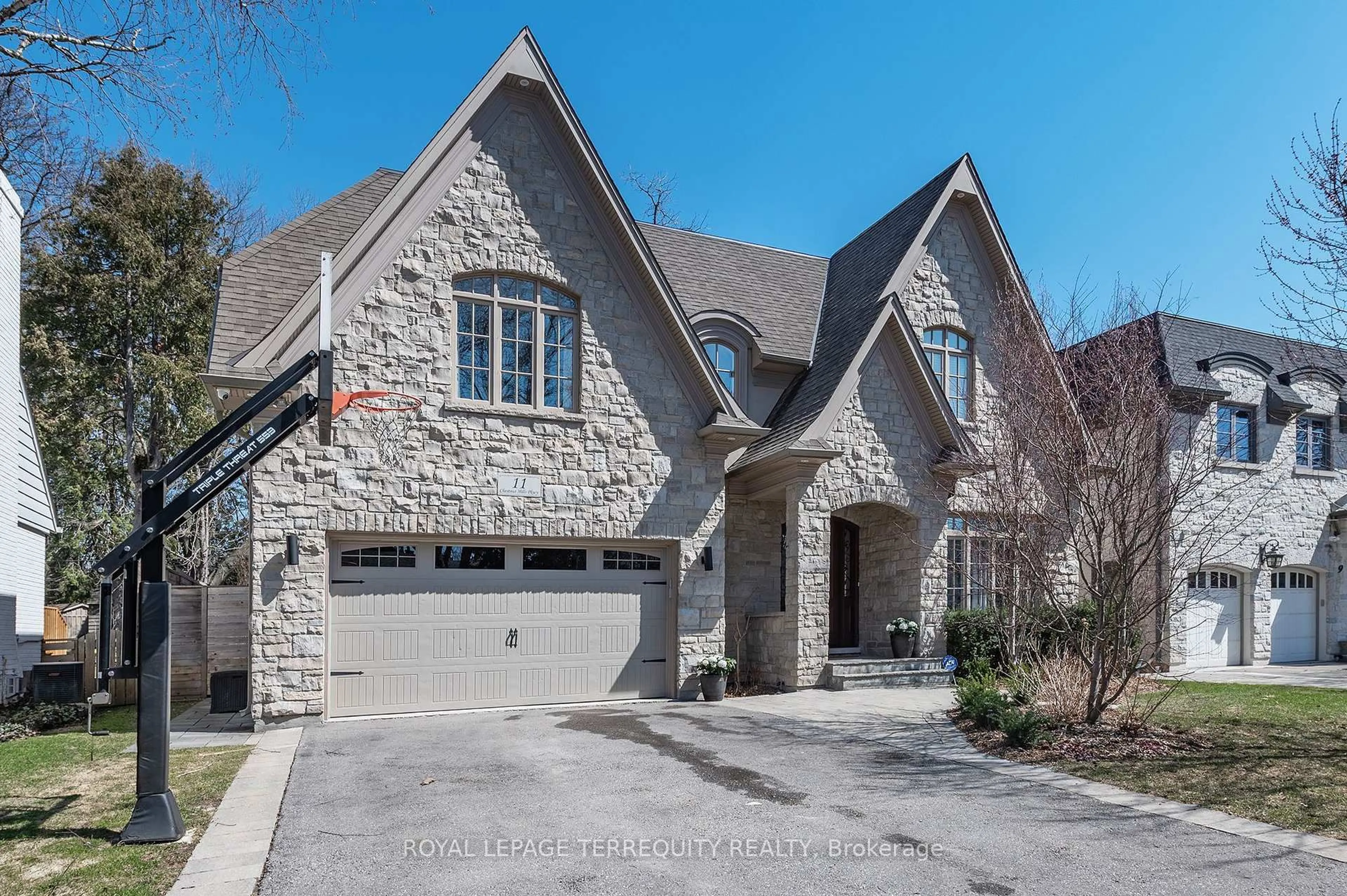Home with brick exterior material, street for 11 Chestnut Hills Pkwy, Toronto Ontario M9A 3P7