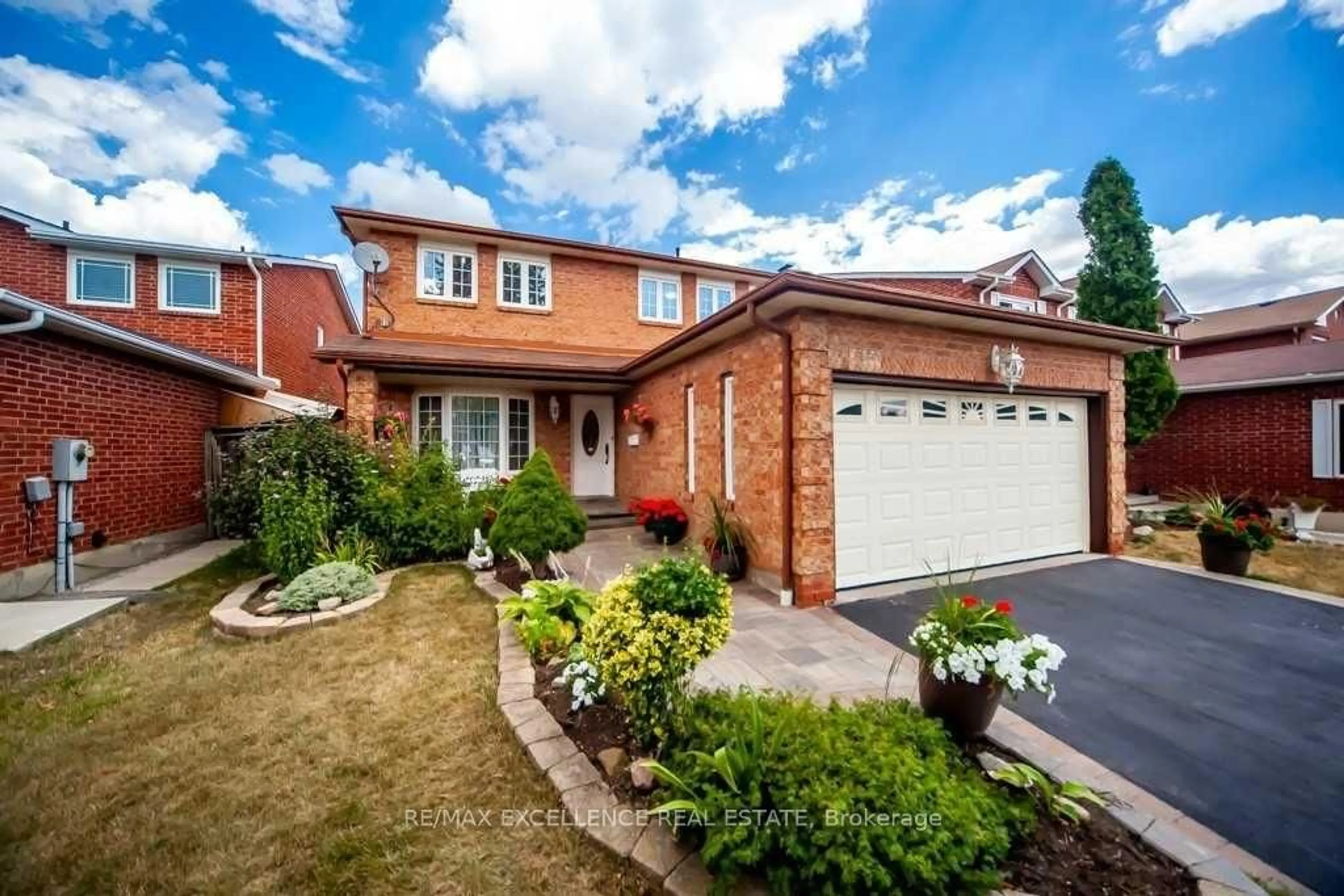 Home with brick exterior material, street for 30 Ballycastle Cres, Brampton Ontario L6Z 2T6